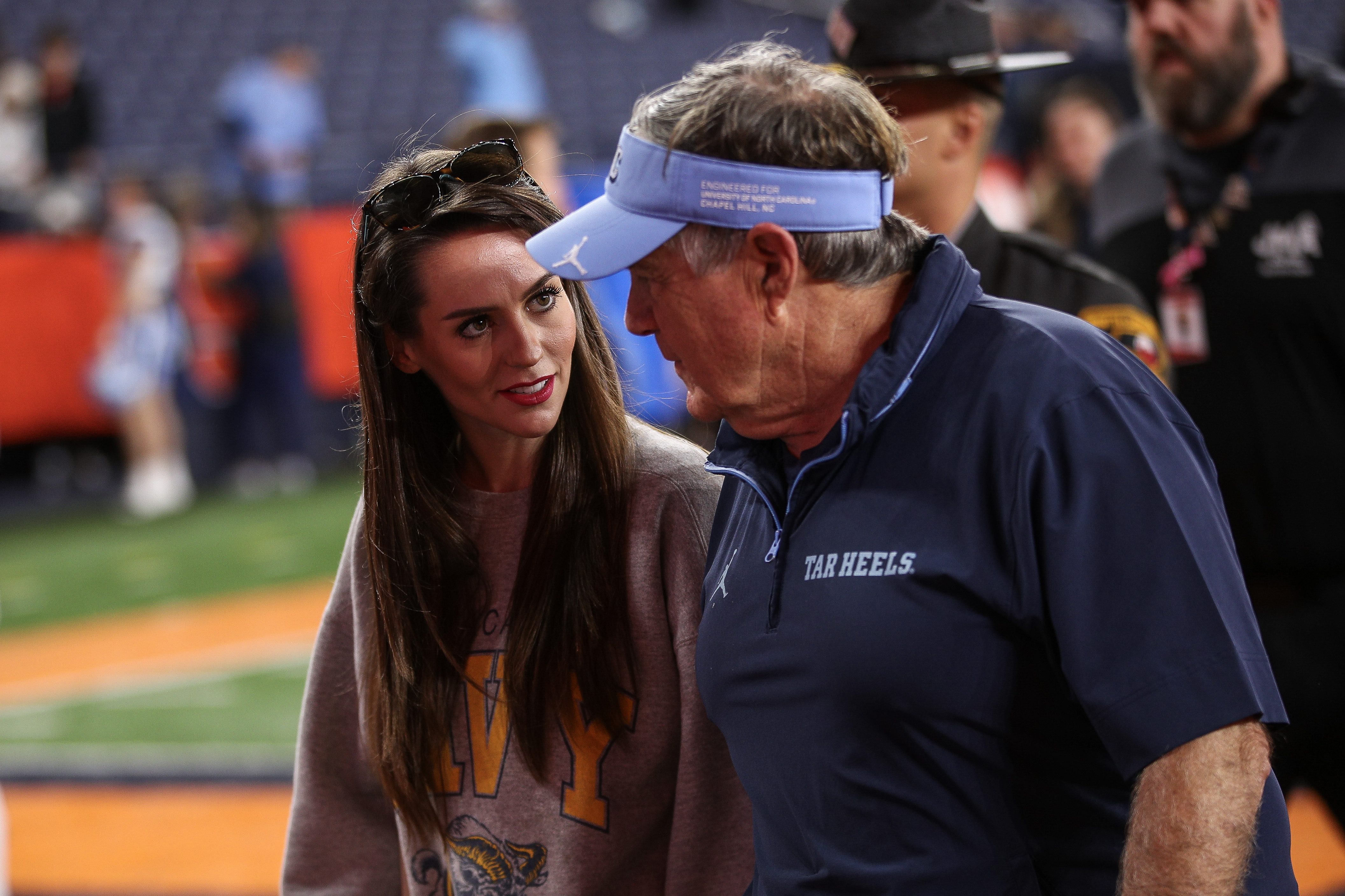 Jordon Hudson and Bill Belichick during the game between the North Carolina Tar Heels and the Syracuse Orange in Syracuse, New York on October 31, 2025. | Source: Getty Images