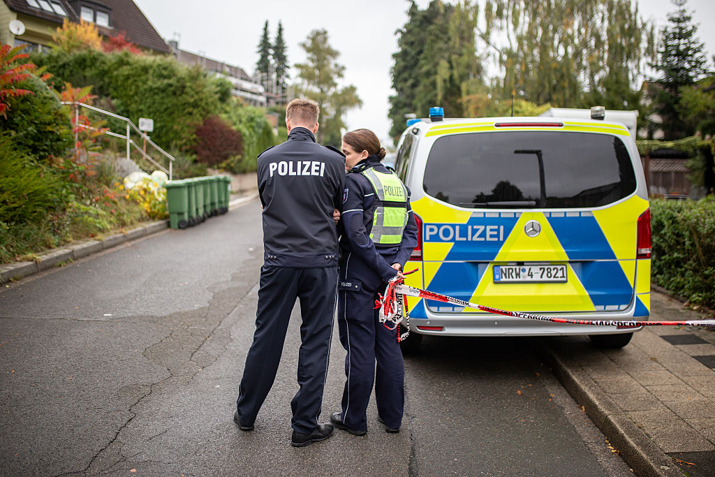 HERDECKE, GERMANY - OCTOBER 07: Police stand near the home of the mayor-elect of Herdecke, Iris Stalzer, after she was stabbed to death by unknown persons on October 07, 2025 in Herdecke, Germany | Source: Getty Images