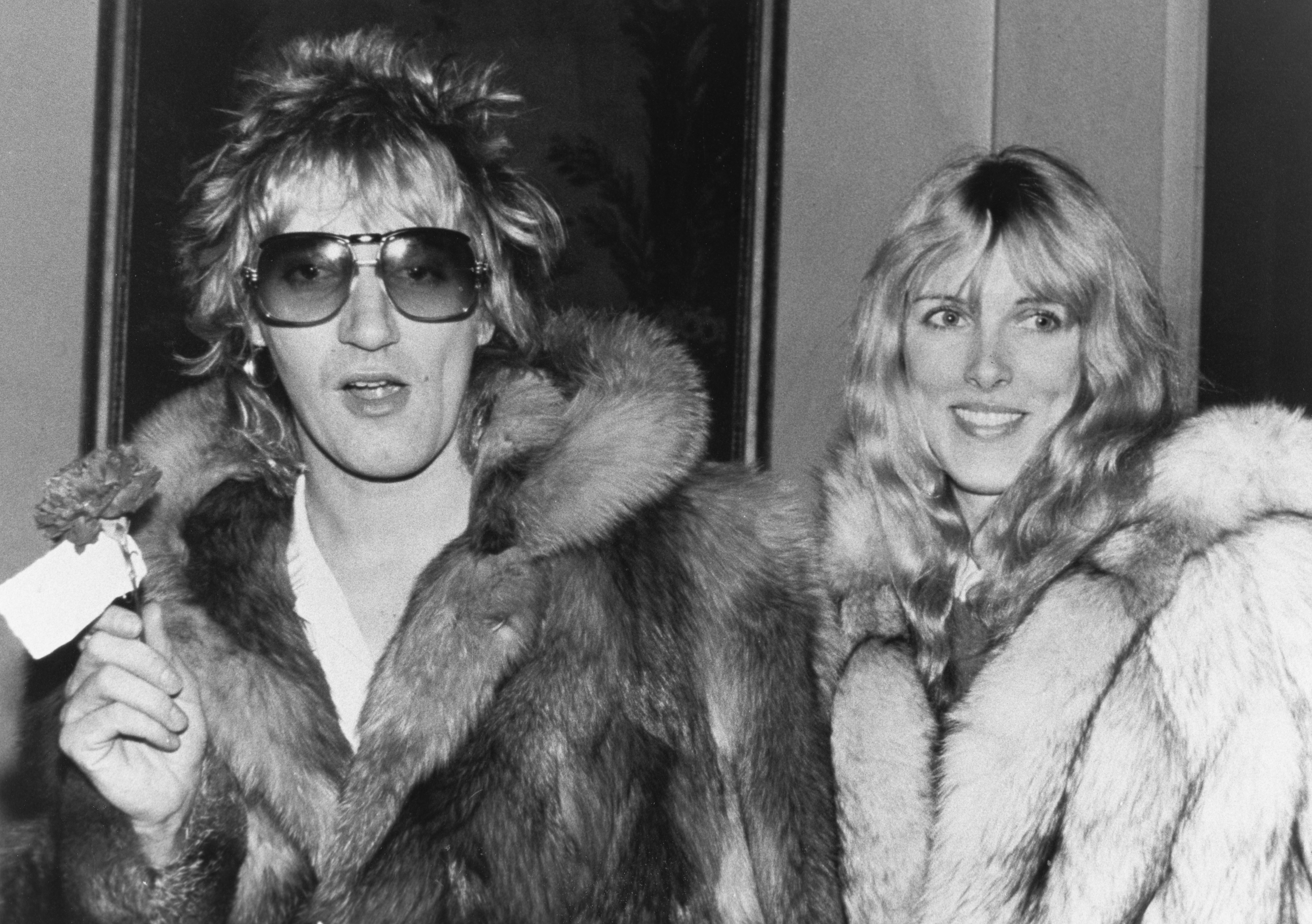 British singer and songwriter Rod Stewart and his partner, American actress Alana Hamilton, attend Rod's 34th birthday celebration at the Carlyle Hotel in New York City on January 10, 1979. | Source: Getty Images