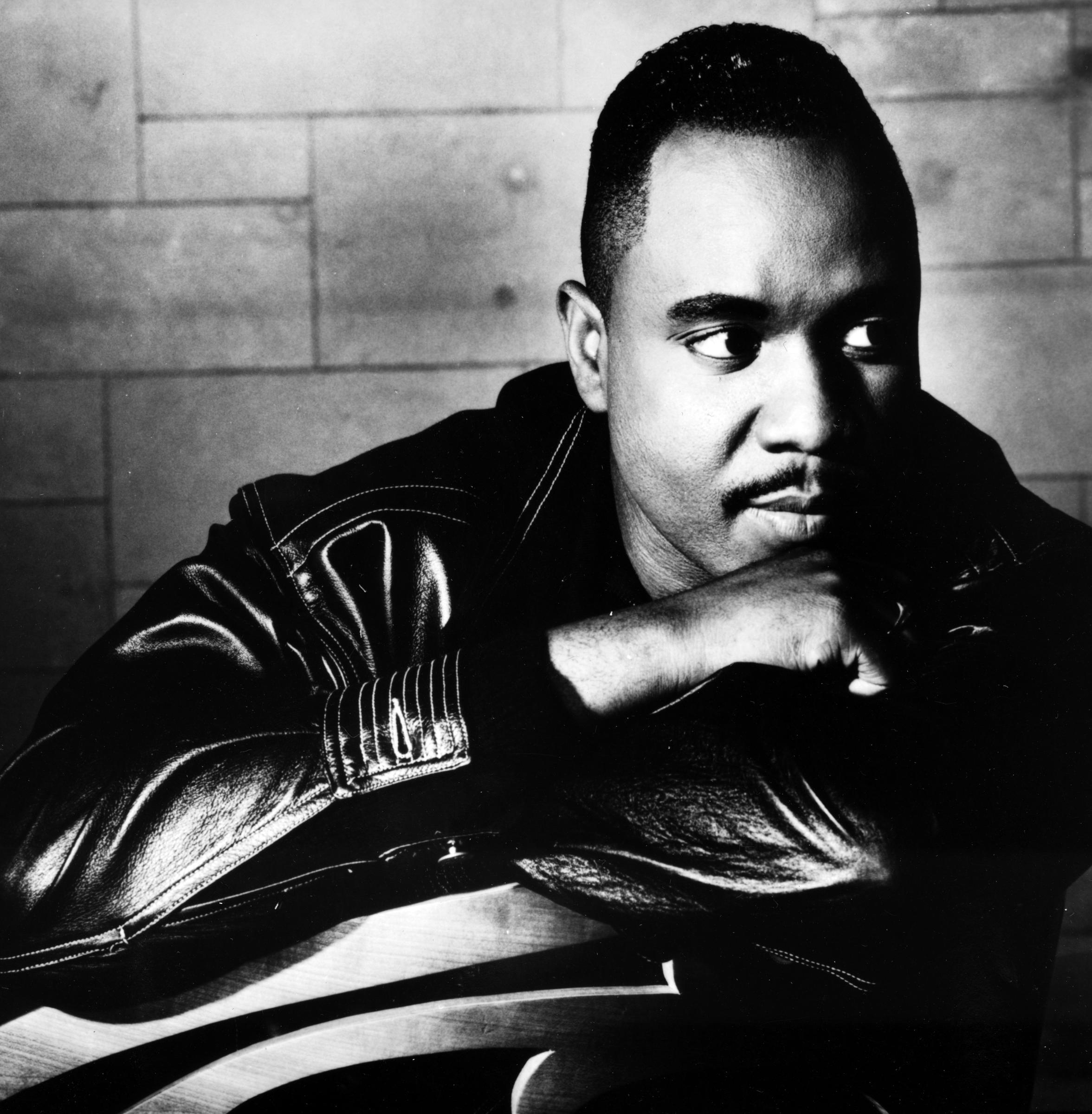 In 1985, the R&B soul singer leaned against the back of a chair for a portrait. His family later remembered him as a kind and generous man who had “gone home to rest” just days after his 69th birthday. | Source: Getty Images
