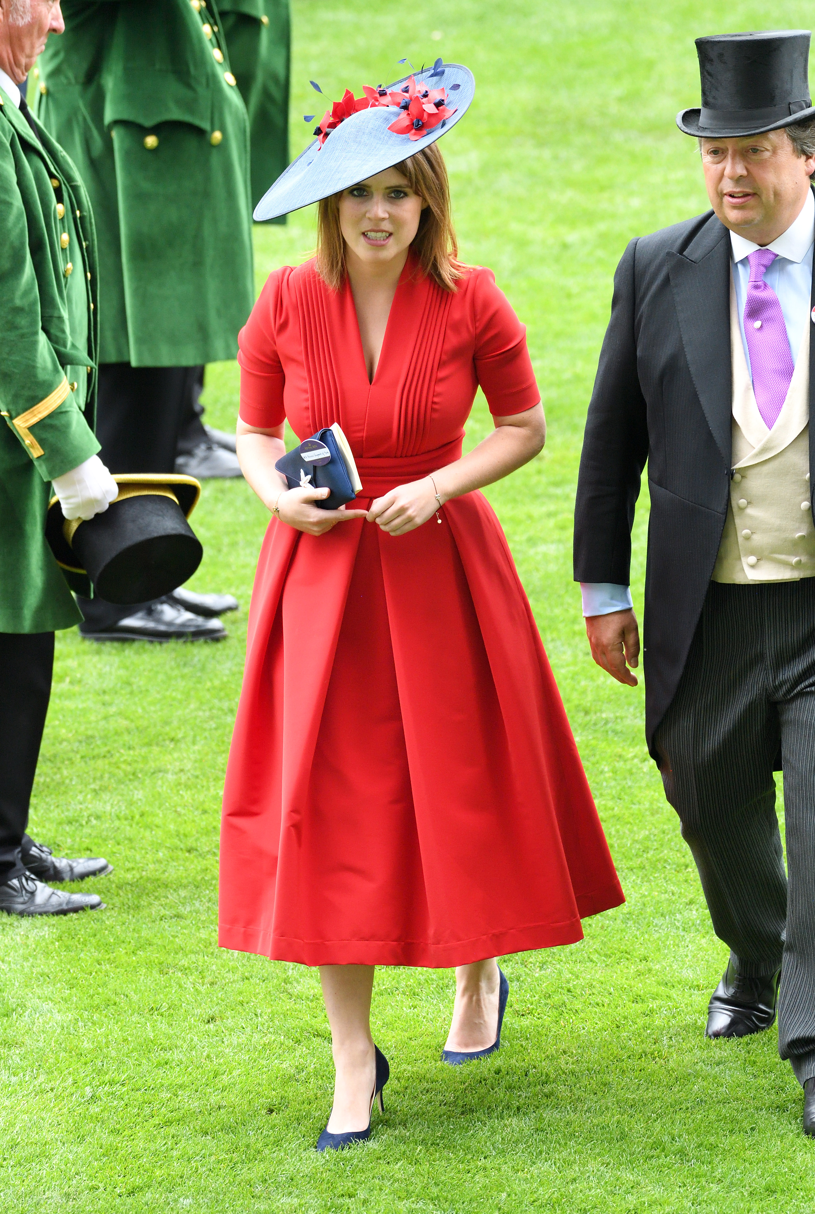 Bright color has remained one of the recurring threads in Eugenie's fashion history, even as her overall aesthetic has changed. That willingness to embrace statement dressing makes her more recent turn toward minimalism especially noticeable.