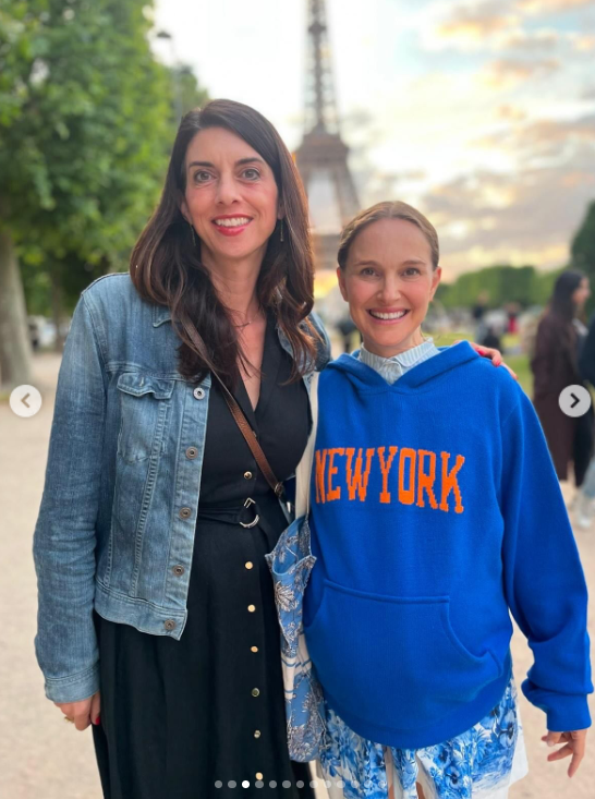 Portman smiled alongside a friend with the Eiffel Tower rising in the background during an outing in Paris. The snapshot was one of several casual moments included in the Instagram carousel. | Source: Instagram/natalieportman