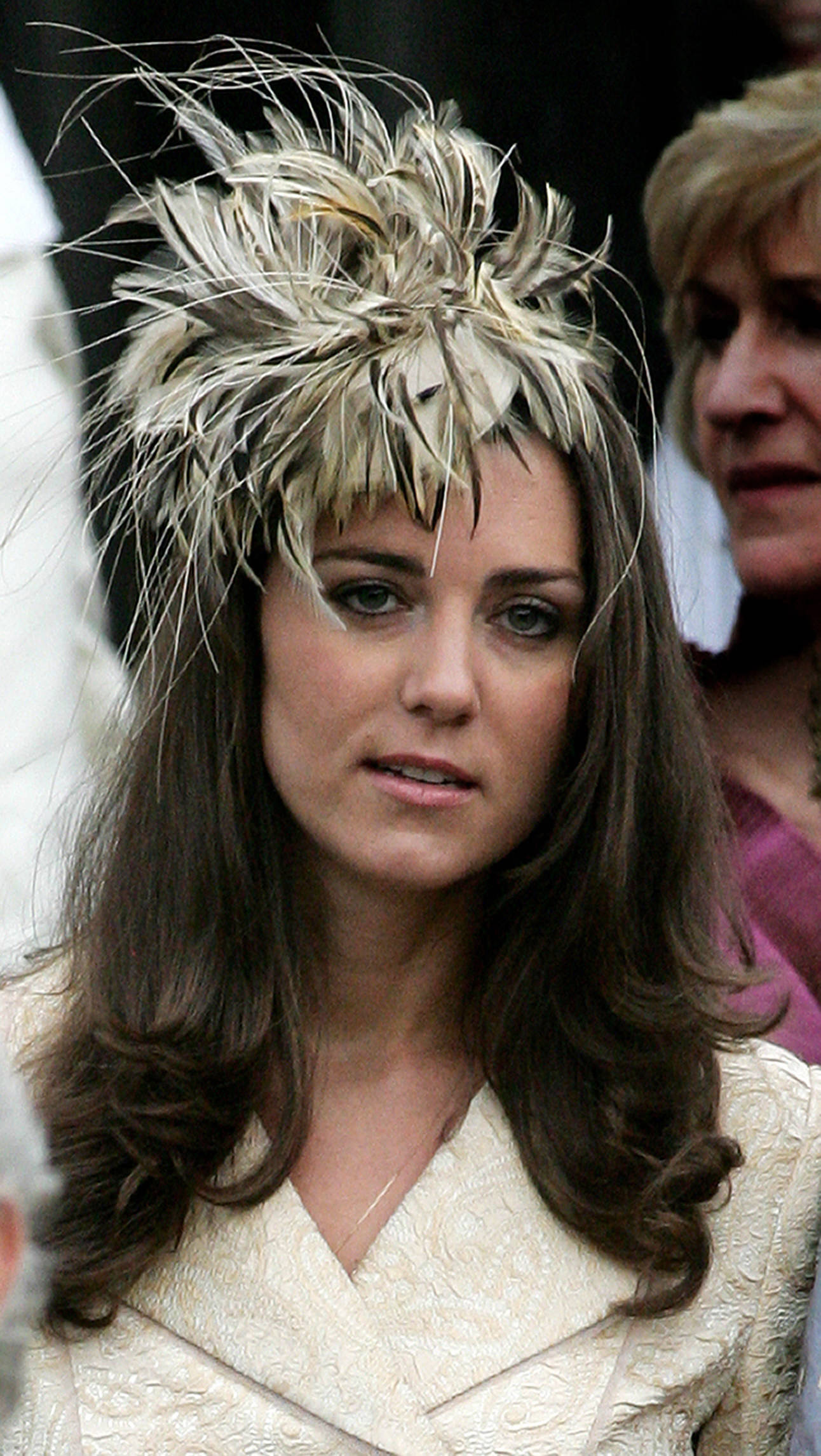 Kate Middleton leaves Lacock Cyraiax Church for the wedding of Harry Lopes and Laura Parker-Bowles, on May 6, 2006 | Source: Getty Images