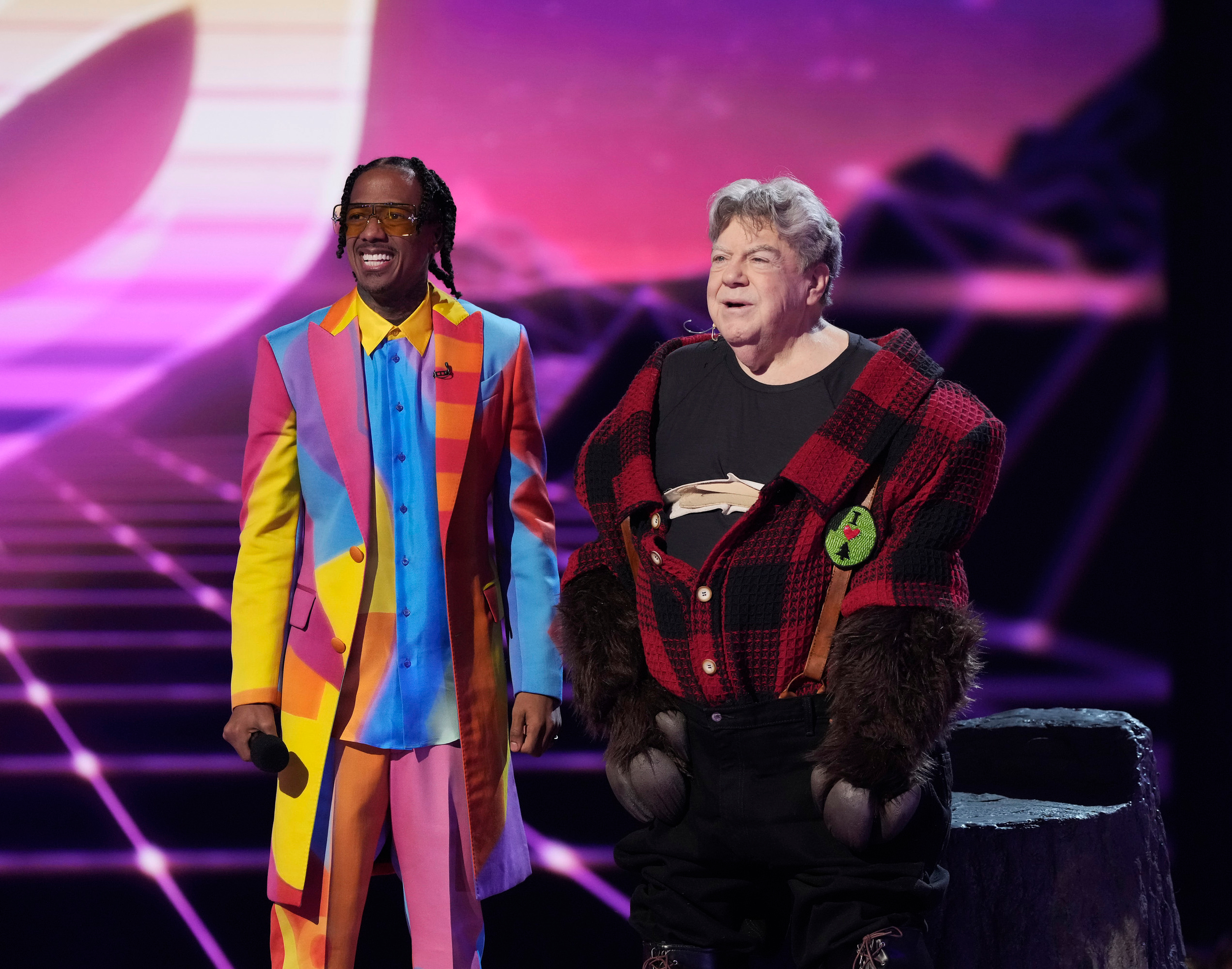 George Wendt appears with host Nick Cannon during the "'80s Night" episode of Season Nine of "The Masked Singer," which aired on March 29, 2023 | Source: Getty Images