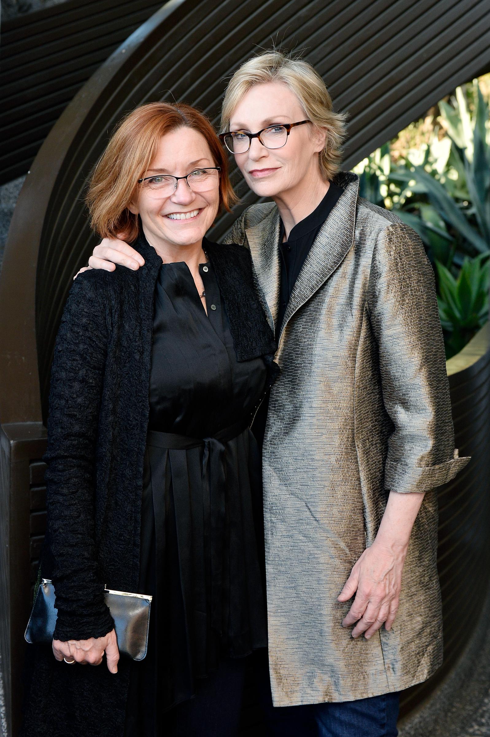 Jennifer Cheyne and Jane Lynch attend Ray Booth "Evocative Interiors" Book Signing on May 8, 2018, in Los Angeles, California. | Source: Getty Images
