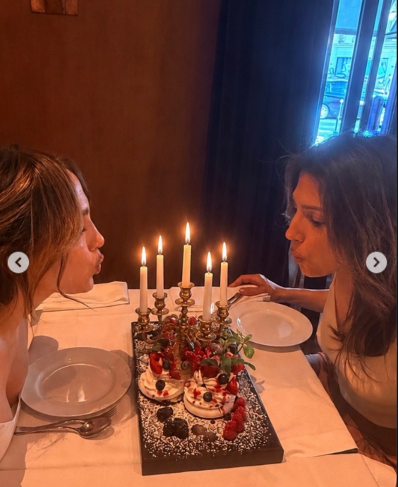 Jennifer and Lynda shared a birthday moment as they leaned over matching desserts topped with candles. The image reflected the "double birthday sister trip" Jennifer celebrated in her Instagram caption. | Source: Instagram/jlo