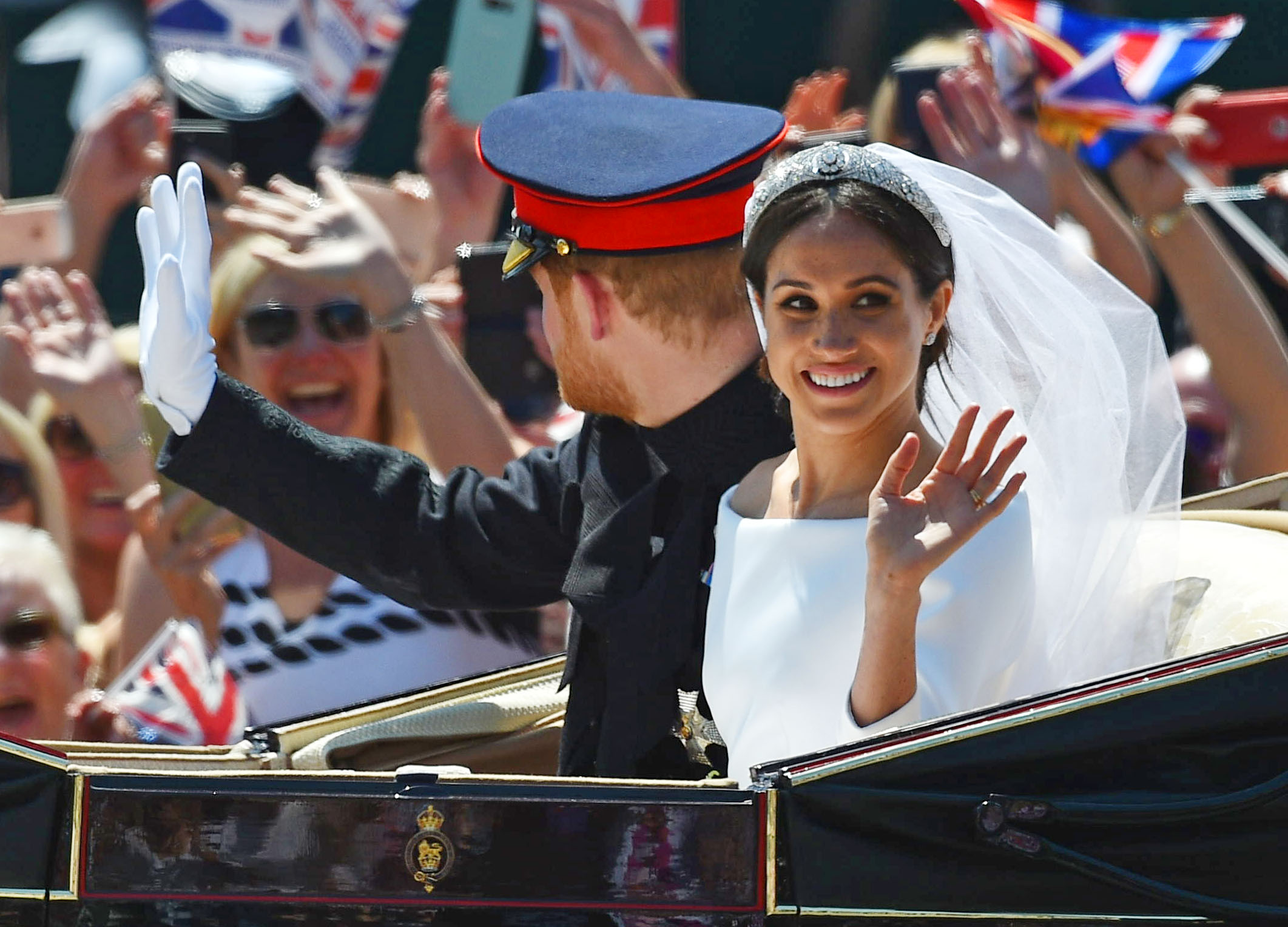 After their royal wedding, Meghan and Harry traveled through Windsor in an open carriage as thousands of well-wishers cheered. Behind the celebrations, however, her relationship with her father had already become strained — a family rift that would remain unresolved for years. | Source: Getty Images.