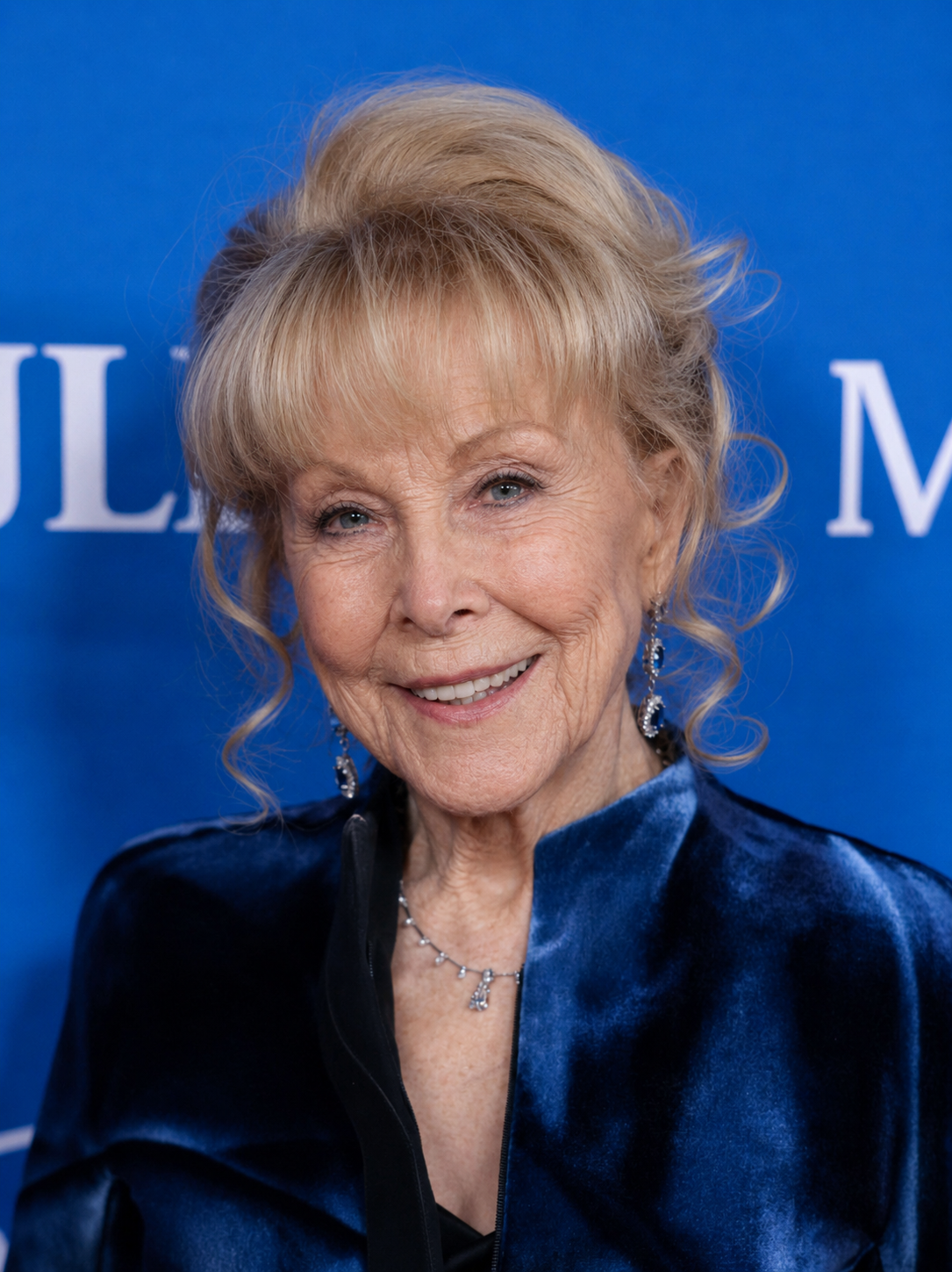 This AI visualization imagines Barbara Eden with more pronounced facial lines and reduced facial fullness, offering one interpretation of how she might have looked without the cosmetic procedures she has long been rumored to have undergone. | Source: ChatGPT