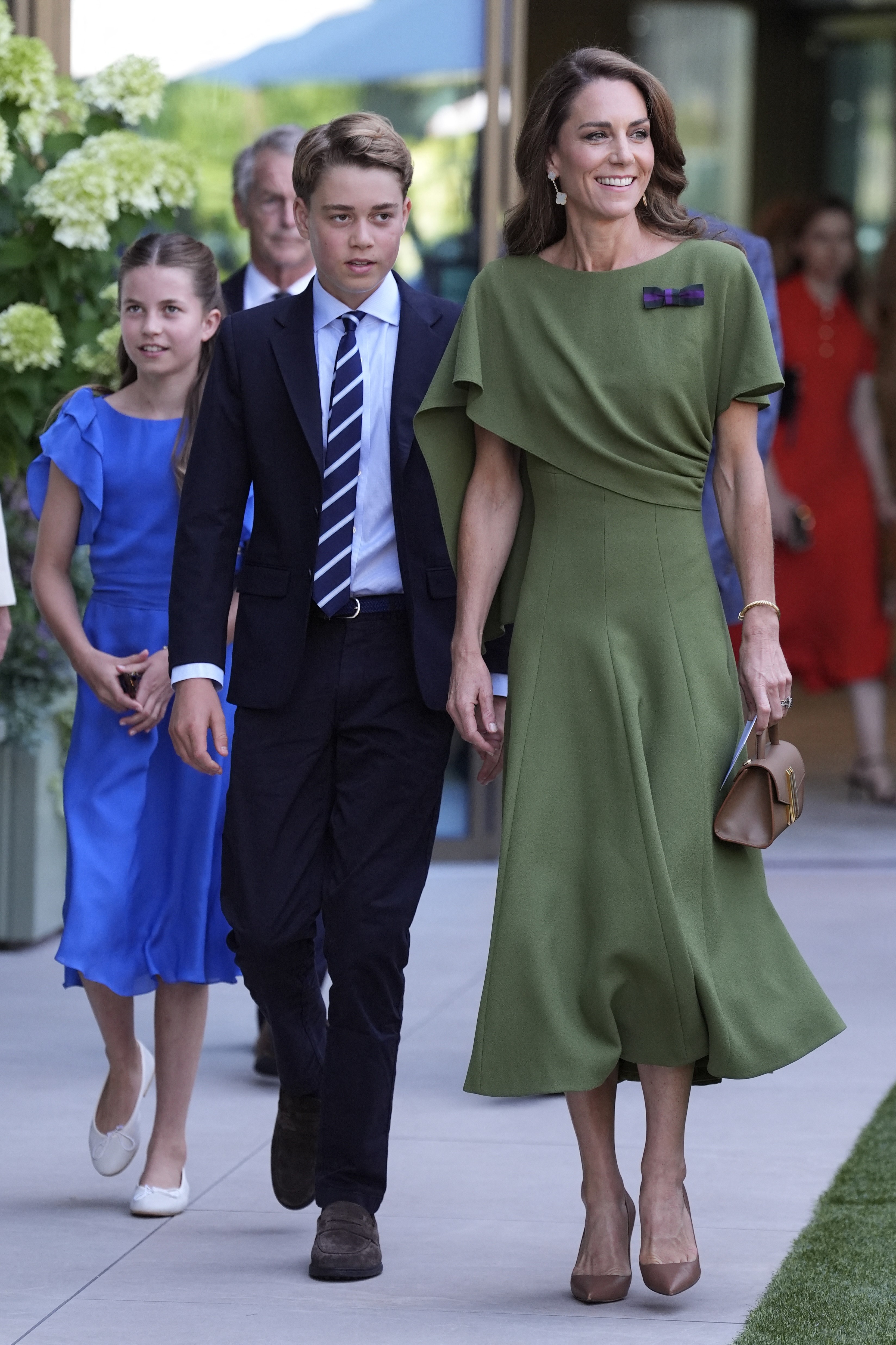 Catherine arrived with Prince George and Princess Charlotte for the men's singles final, while Prince Louis did not attend. Their appearance together quickly became one of the day's biggest talking points. | Source: Getty Images