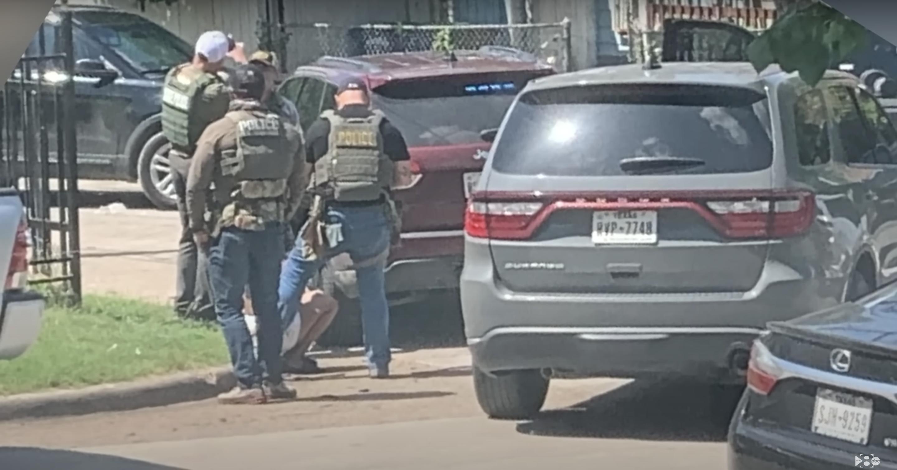 Law enforcement officers take a suspect into custody following the fatal hit-and-run incident that killed Ava Moore | Source: YouTube/WFAA8