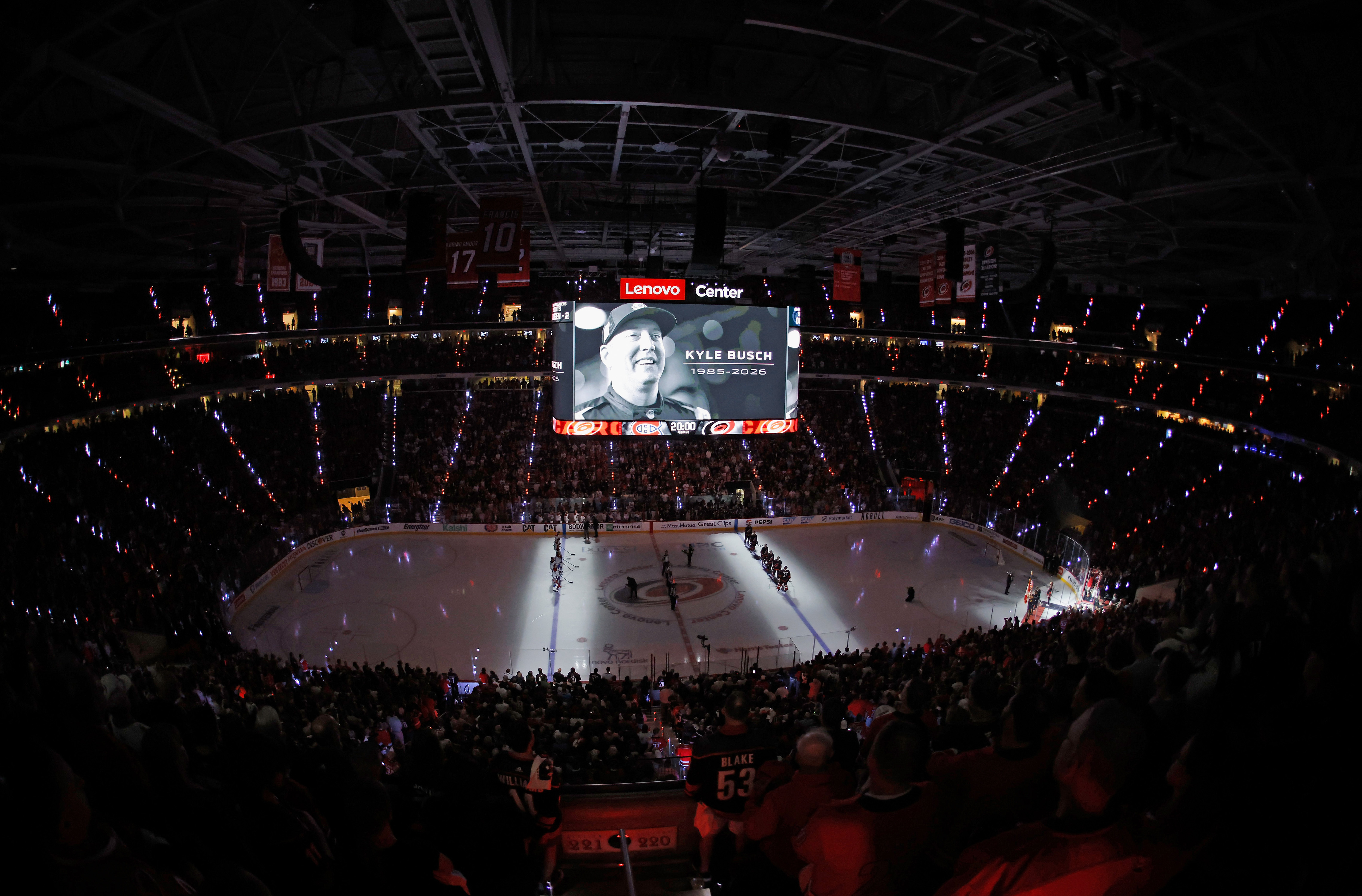 The Carolina Hurricanes and the Montréal Canadiens observe a moment of silence for the late Kyle Busch before Game One of the Eastern Conference Final of the 2026 Stanley Cup Playoffs in Raleigh, North Carolina on May 21, 2026. | Source: Getty Images