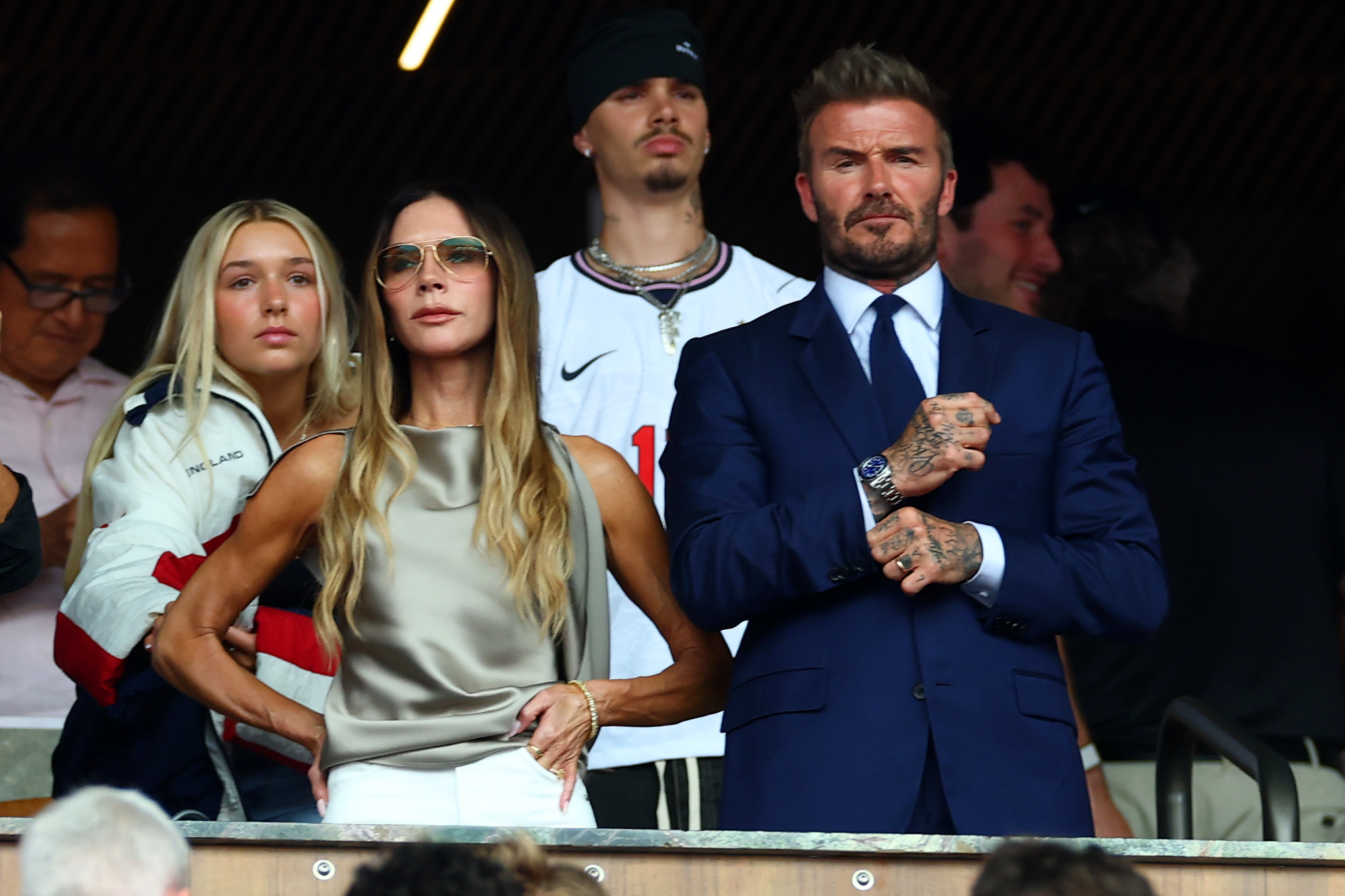 The Beckhams also enjoy family outings beyond the dinner table, attending England's 2026 World Cup quarterfinal against Norway in Miami with two of their children. | Source: Getty Images.