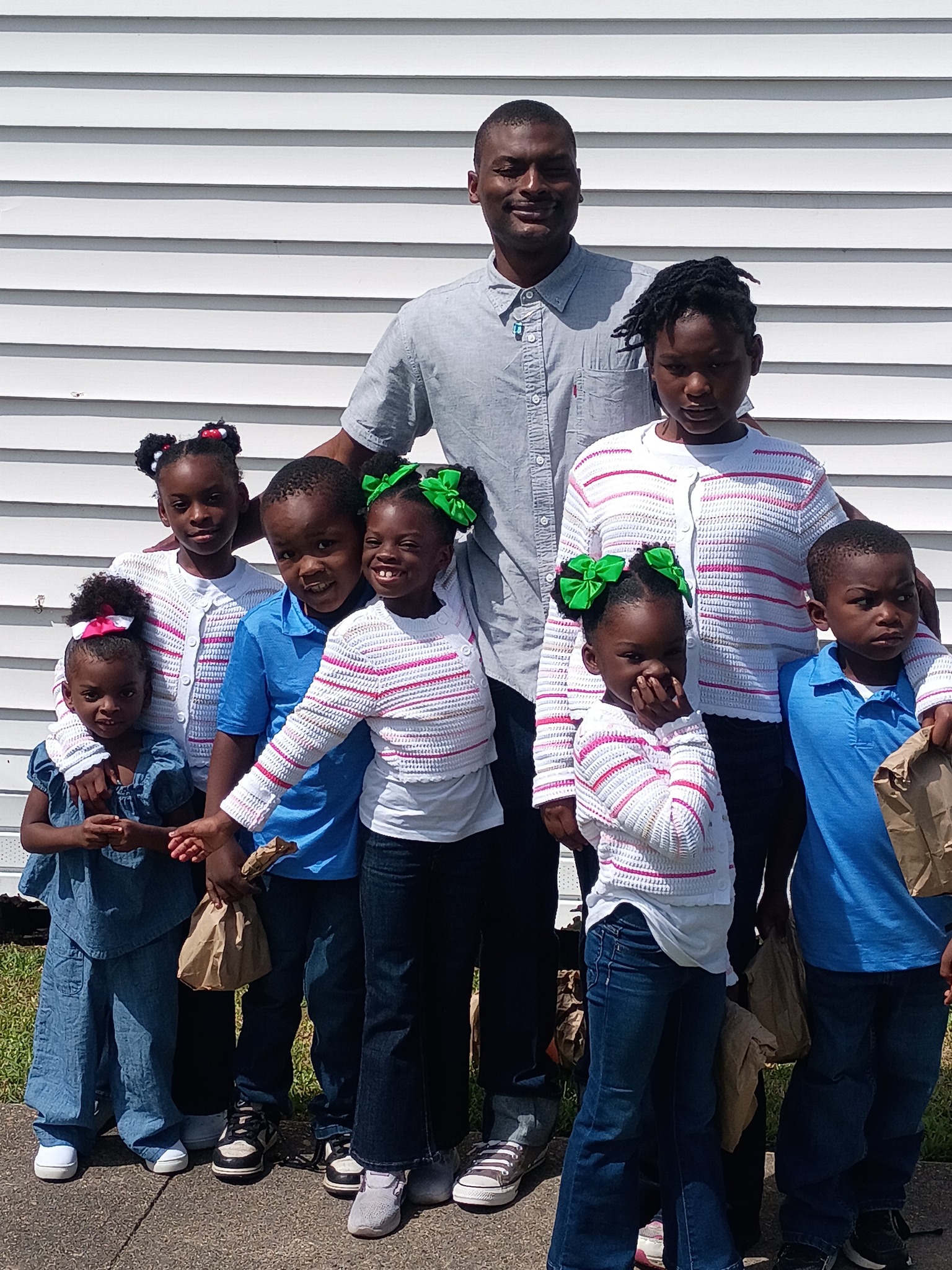 The suspect, Shamar Elkins, seen with his children in a post dated April 5, 2026 | Source: Facebook/shamar.elkins