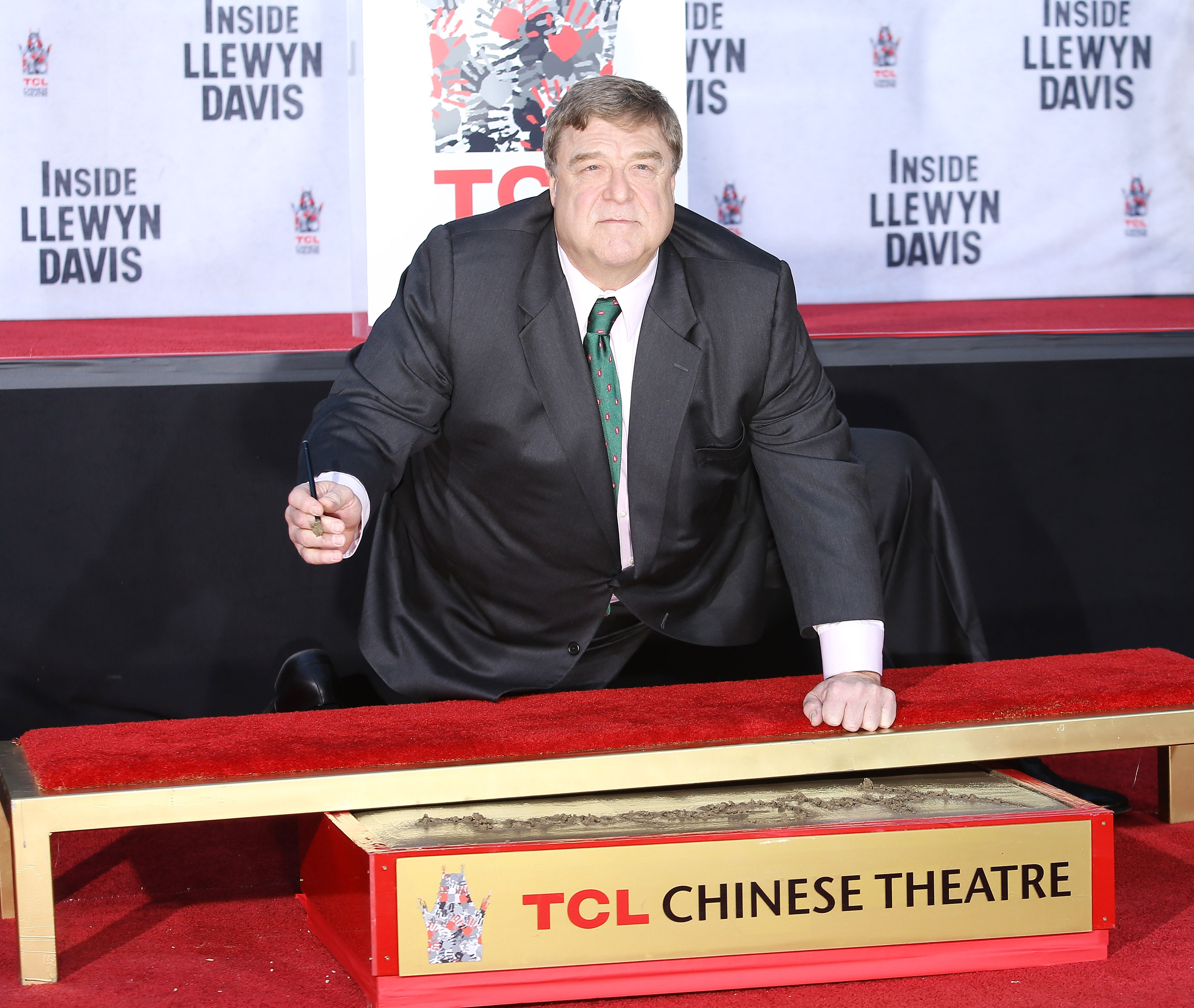 John Goodman attends his hand and footprint ceremony at TCL Chinese Theatre on November 14, 2013, in Hollywood, California, several years after he began exercising regularly and changing the way he ate. | Source: Getty Images