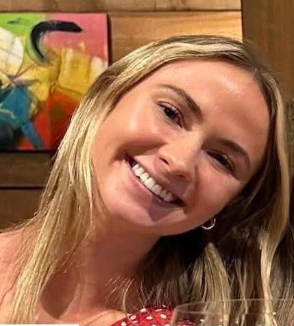 Katie Mannix smiles in a personal photograph. The 24-year-old was remembered by family friends for her playful personality and the warmth she brought to gatherings. | Source: Photo credit to be confirmed. | Source: Facebook/@katie.mannix.5