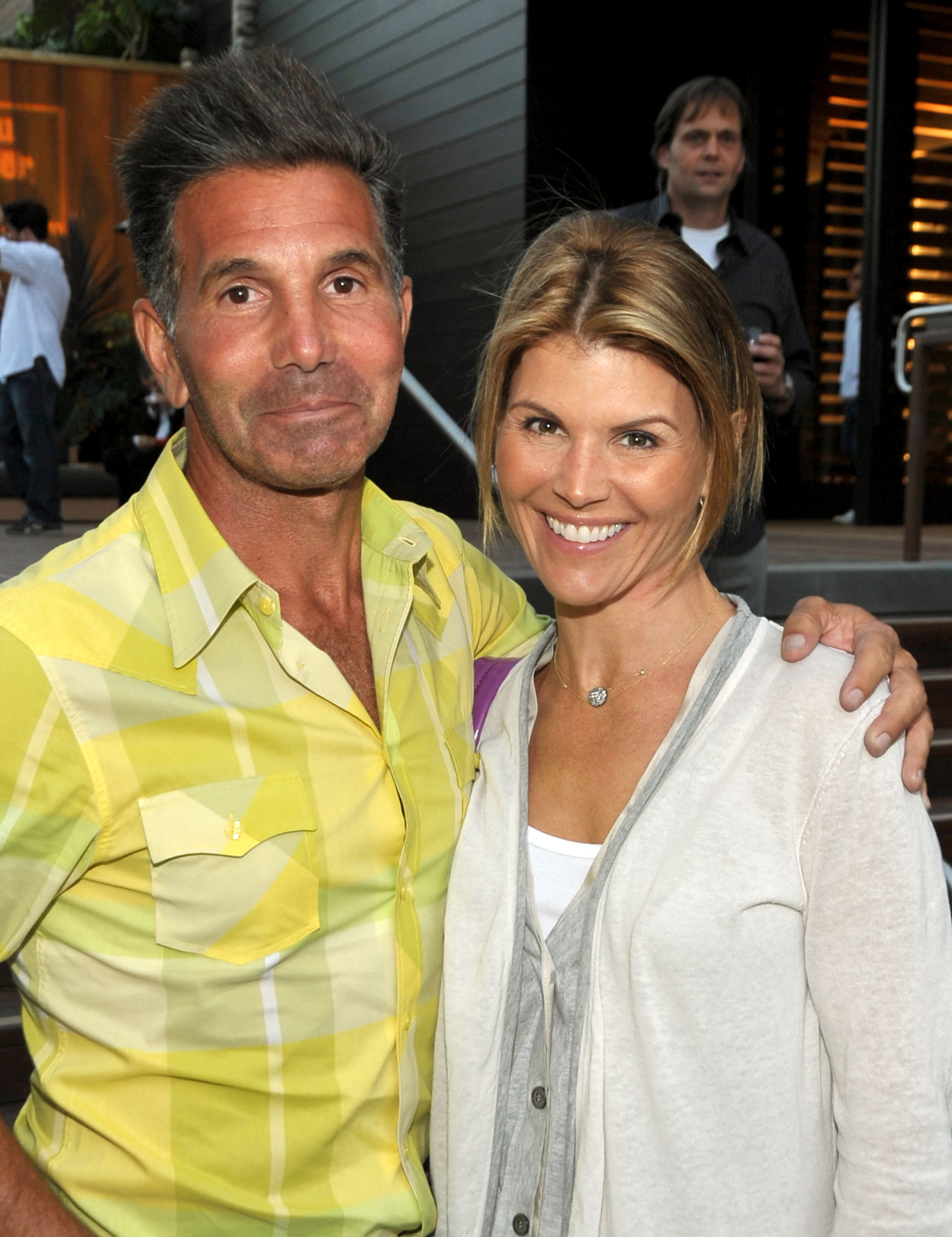 Lori Loughlin and Mossimo Giannulli attend the Malibu Lumber Yard grand opening in Malibu, California, on April 21, 2009. The couple had been married for more than a decade by the time they appeared together at the event. | Source: Getty Images