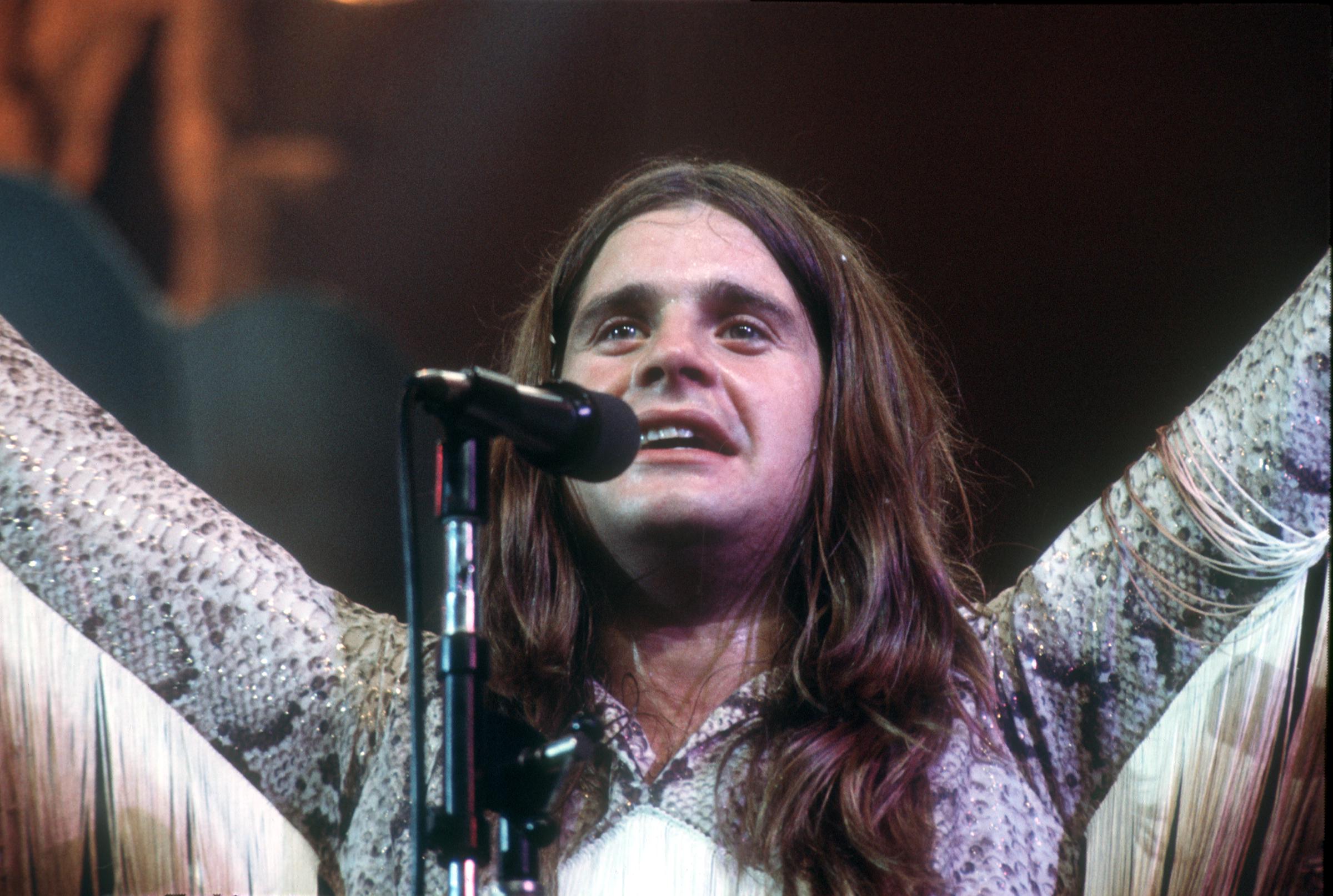 Ozzy Osbourne on stage with Black Sabbath c. 1970. | Source: Getty Images