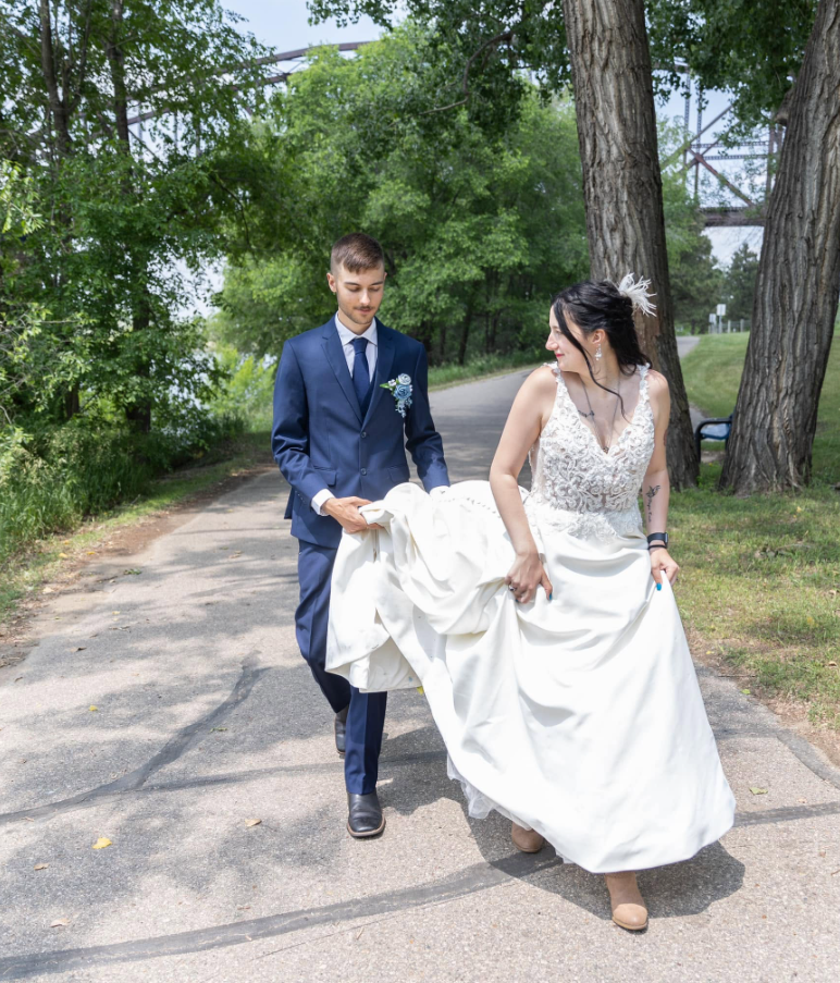 Kailey Erhart and her husband, Cameron, are pictured together in their wedding attire in an outdoor photo. The couple was later separating and planning to divorce when, according to court documents, Cameron told investigators that Erhart had previously threatened to harm herself, him, and their children. | Source: Facebook/Kailey Erhart