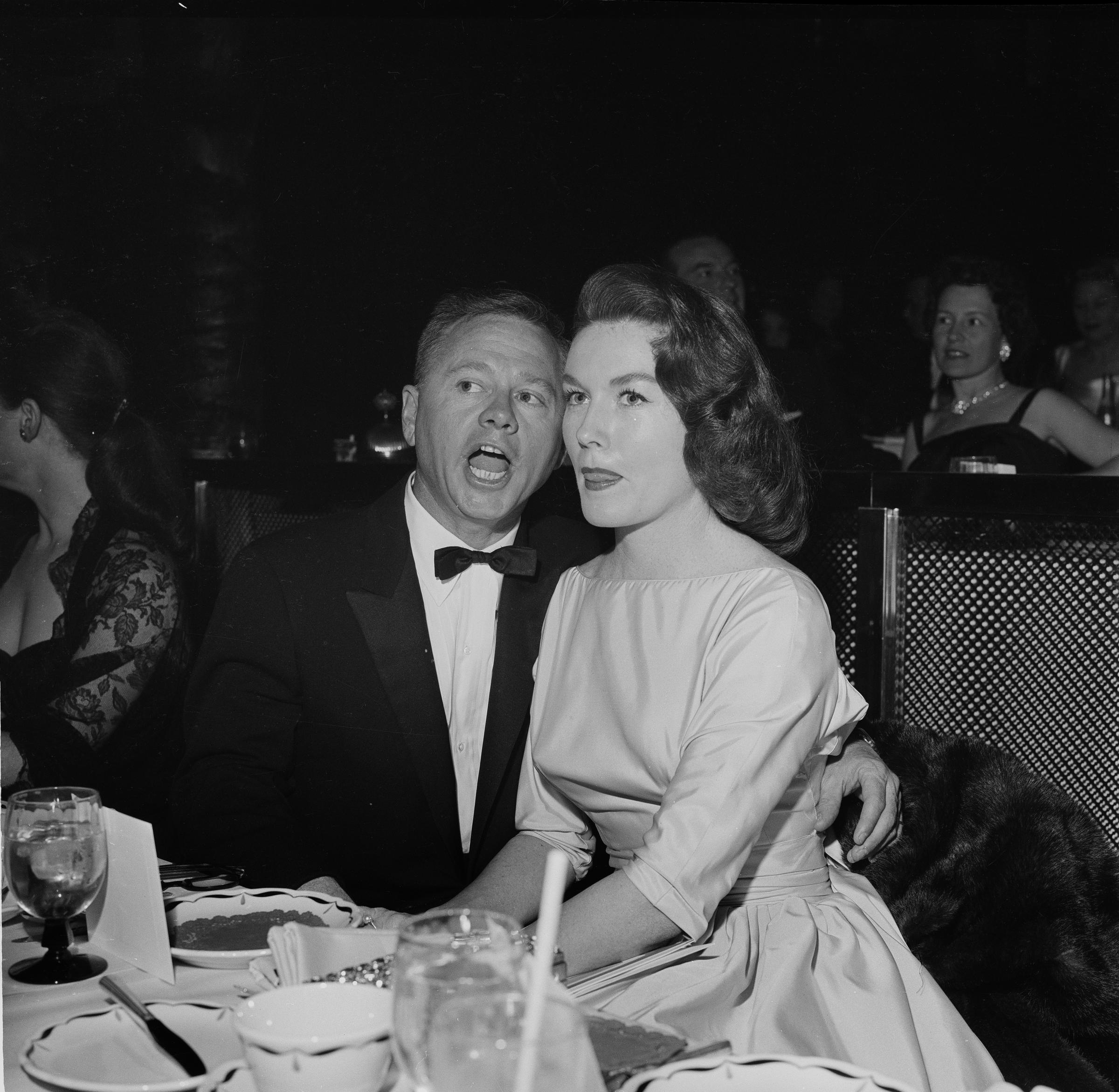 Mickey Rooney and Elaine Devry attend an event in Los Angeles, California, circa 1957. | Source: Getty Images