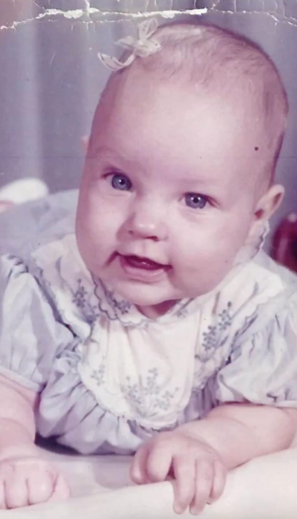 She keeps an active social media account and has posted a few throwback photos, like this one when she was a baby and playfully called it an early "headshot." | Source: Instagram/deborahlforeman