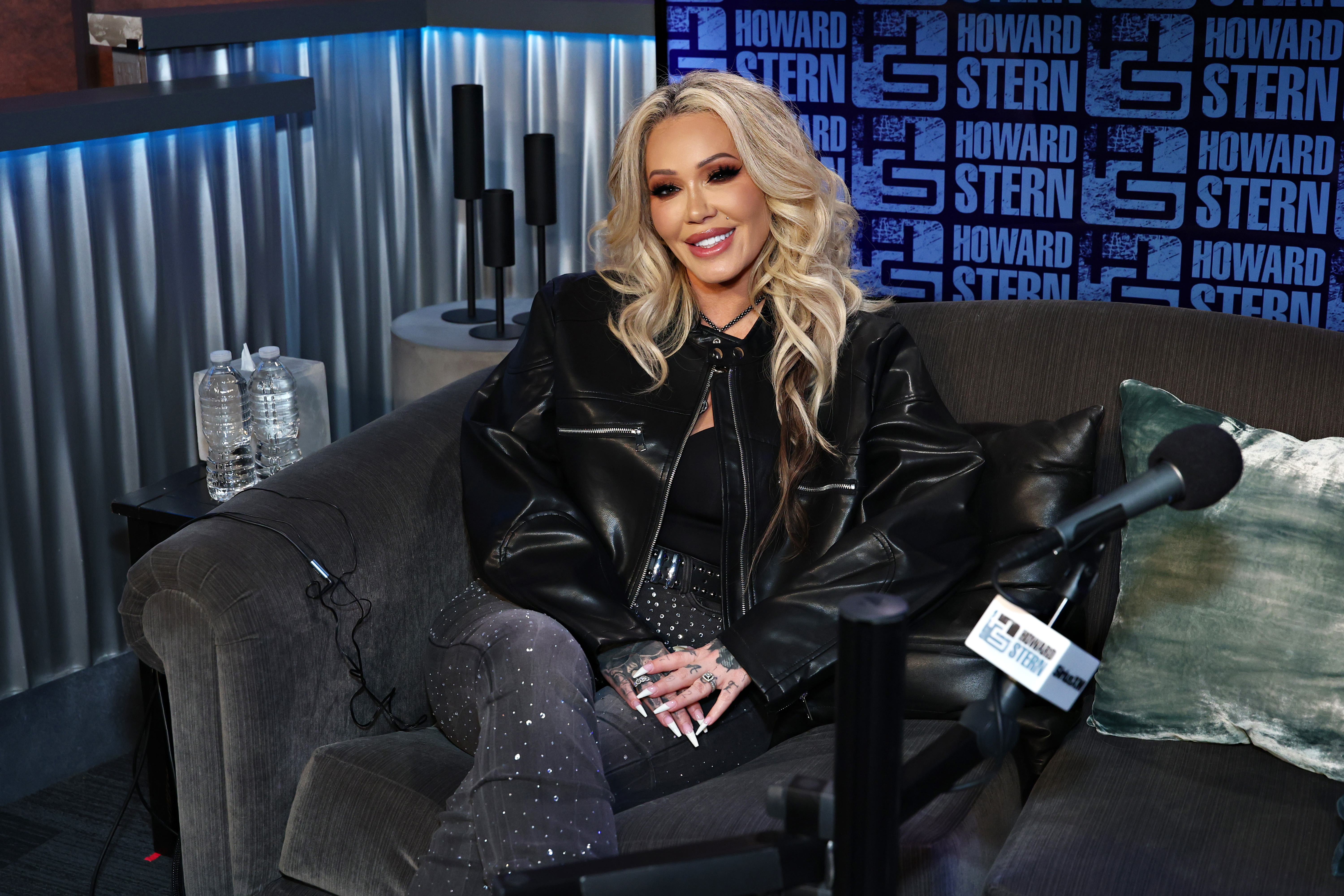 Bunnie XO appears during a radio studio visit amid a period of growing success beyond her role as Jelly Roll's wife. Looking back on the hardships that shaped her journey, she has said she remains grateful for every twist and setback, believing all along that she would eventually find her way to a place of peace and fulfillment. | Source: Getty Images