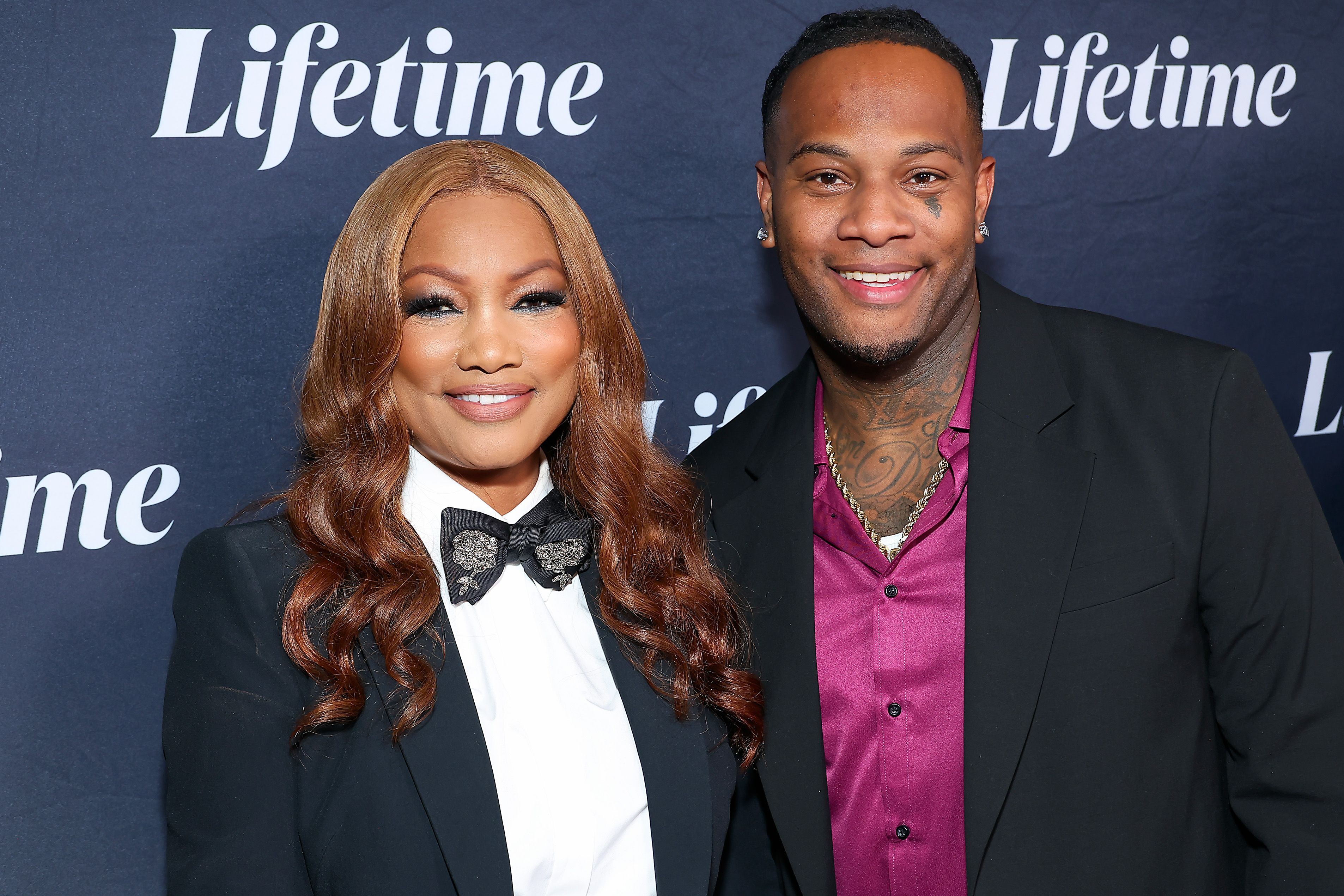 Garcelle Beauvais and her son Oliver Saunders attend the "Tempted by Love" premiere event presented by Terry McMillan in Los Angeles, California, on August 8, 2024 | Source: Getty Images