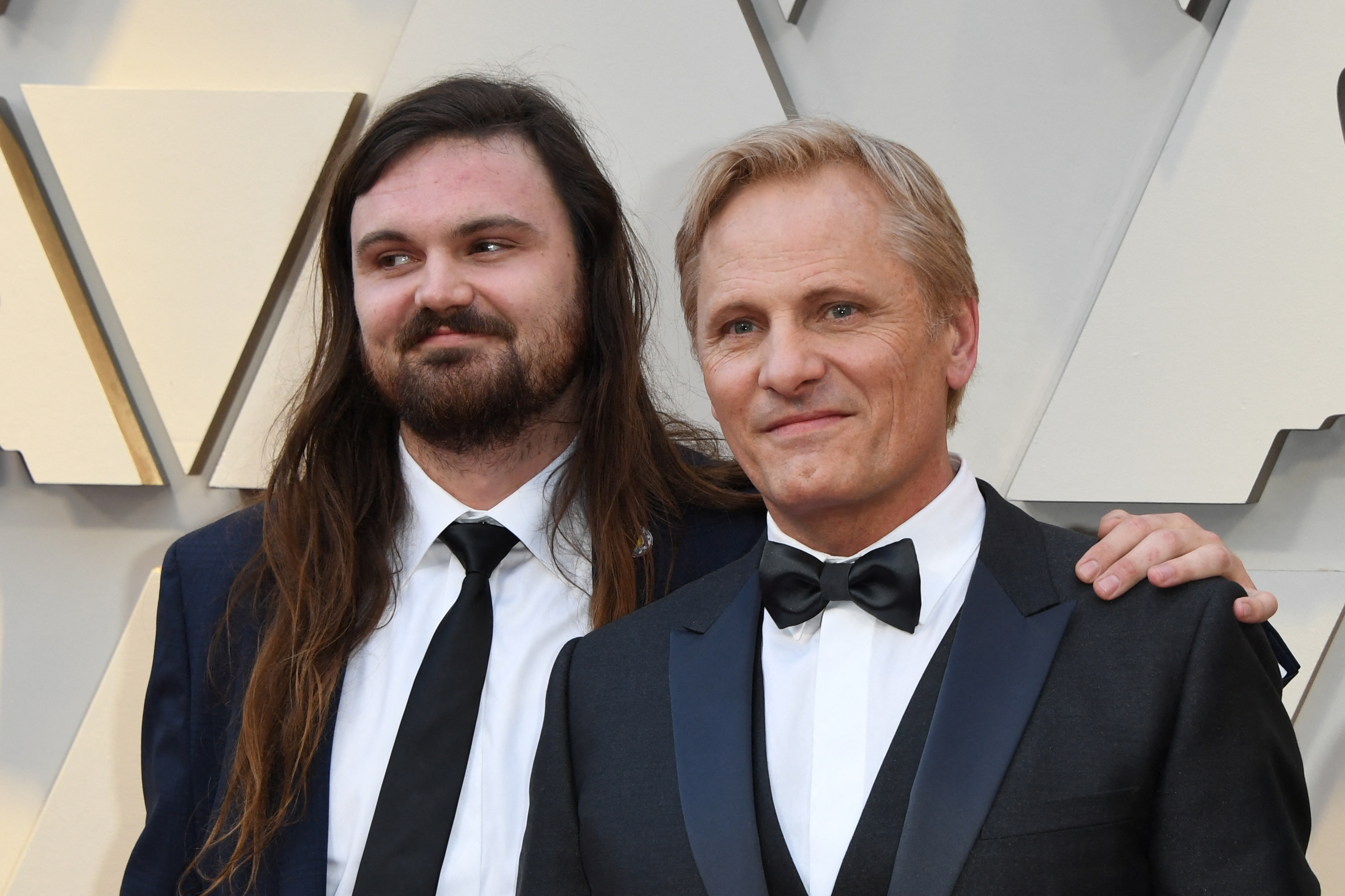 Viggo Mortensen attended the 91st Annual Academy Awards with his son, Henry Mortensen, at the Dolby Theatre in Hollywood, California, on February 24, 2019. As Viggo celebrated his Best Actor nomination for "Green Book," Henry accompanied him on the red carpet, where his flowing hair and beard offered an early glimpse of the look that would later prompt fans to compare him to his father's portrayal of Aragorn.