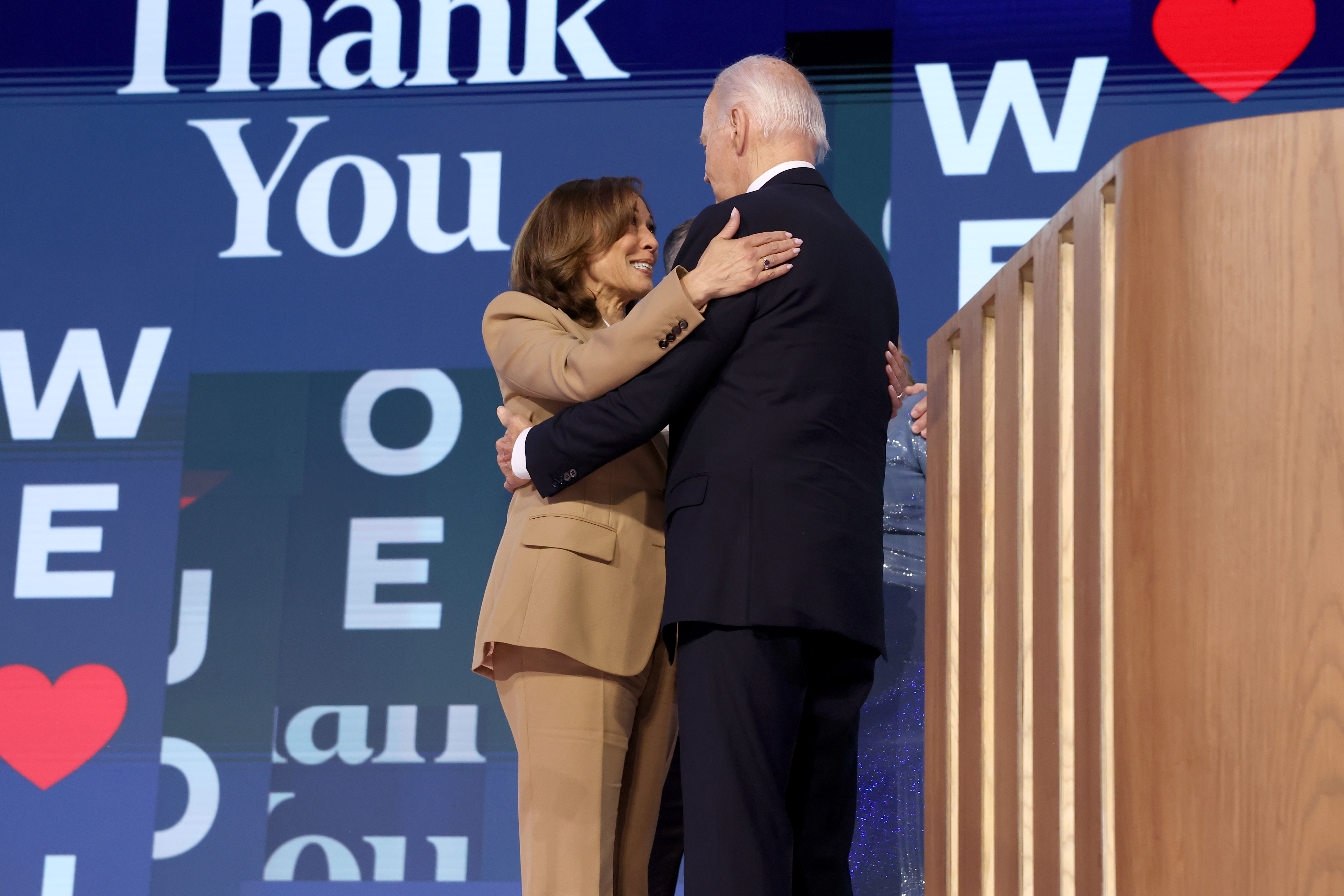 Kamala Harris hugs Joe Biden during the Democratic National Convention in Chicago in Chicago, Illinois, on August 19, 2024 | Source: Getty Images