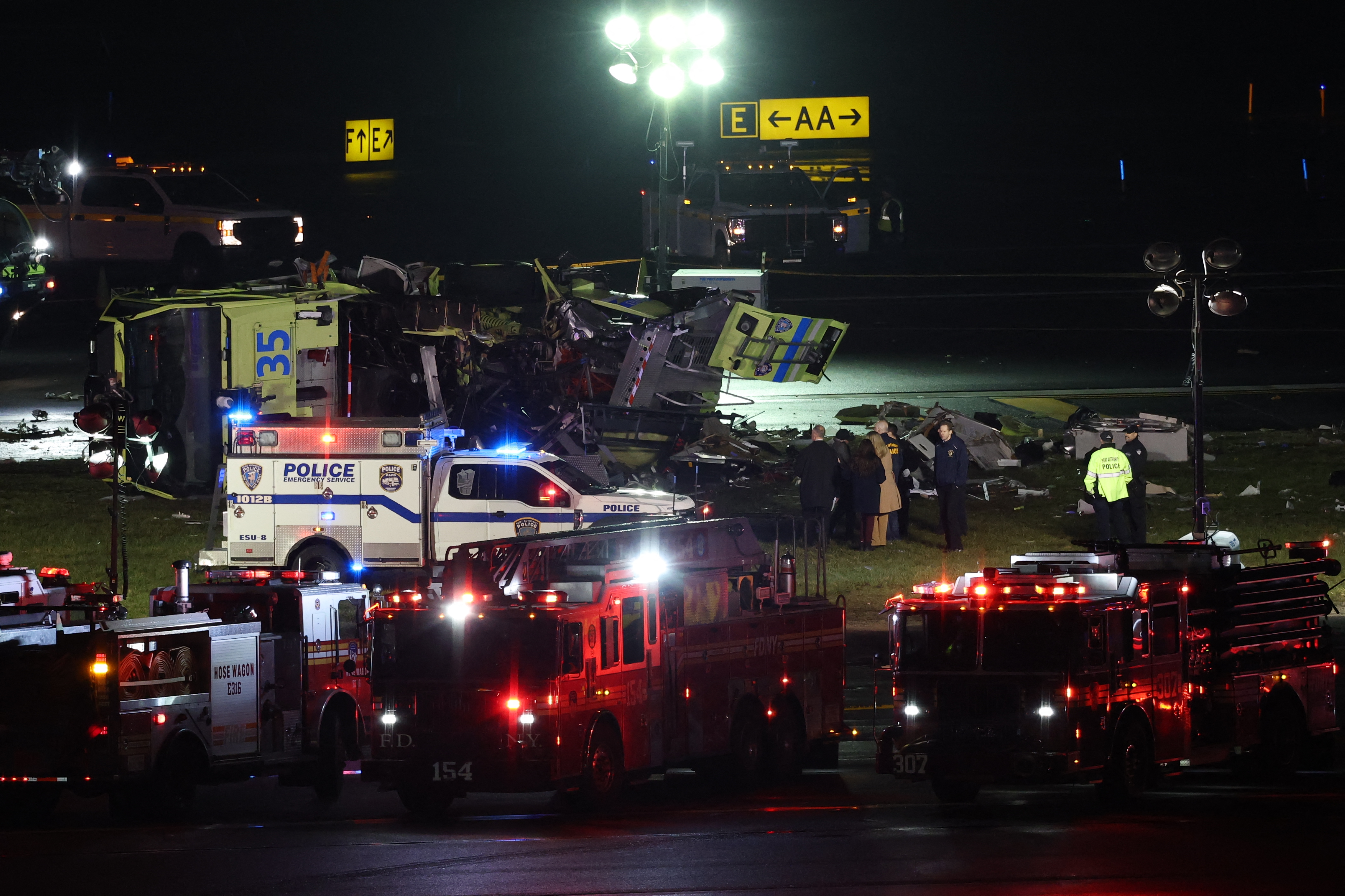 Emergency personnel respond to the Port Authority fire truck struck by a landing Air Canada Express plane at LaGuardia Airport on March 23, 2026, in New York City | Source: Getty Images
