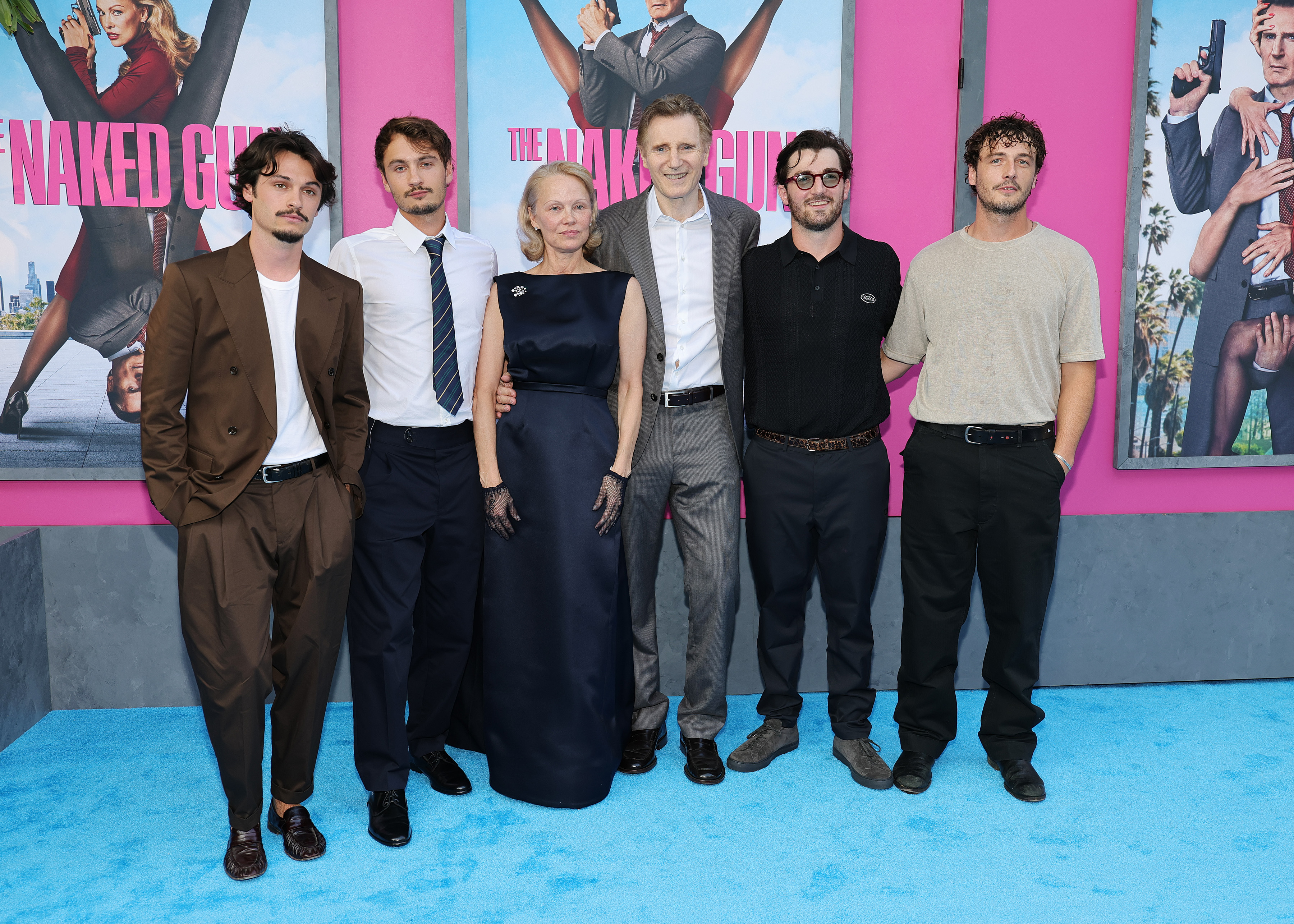 Dylan Jagger Lee, Brandon Thomas Lee, Pamela Anderson, Liam, Daniel, and Micheál Neeson attend "The Naked Gun" New York premiere on July 28, 2025 in New York City. | Source: Getty Images