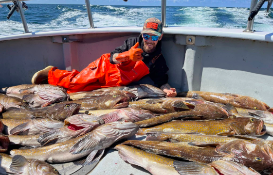 Todd Meadows posing alongside multiple fish that had been caught. | Source: GoFundMe/Honoring Todd Morgan Meadows