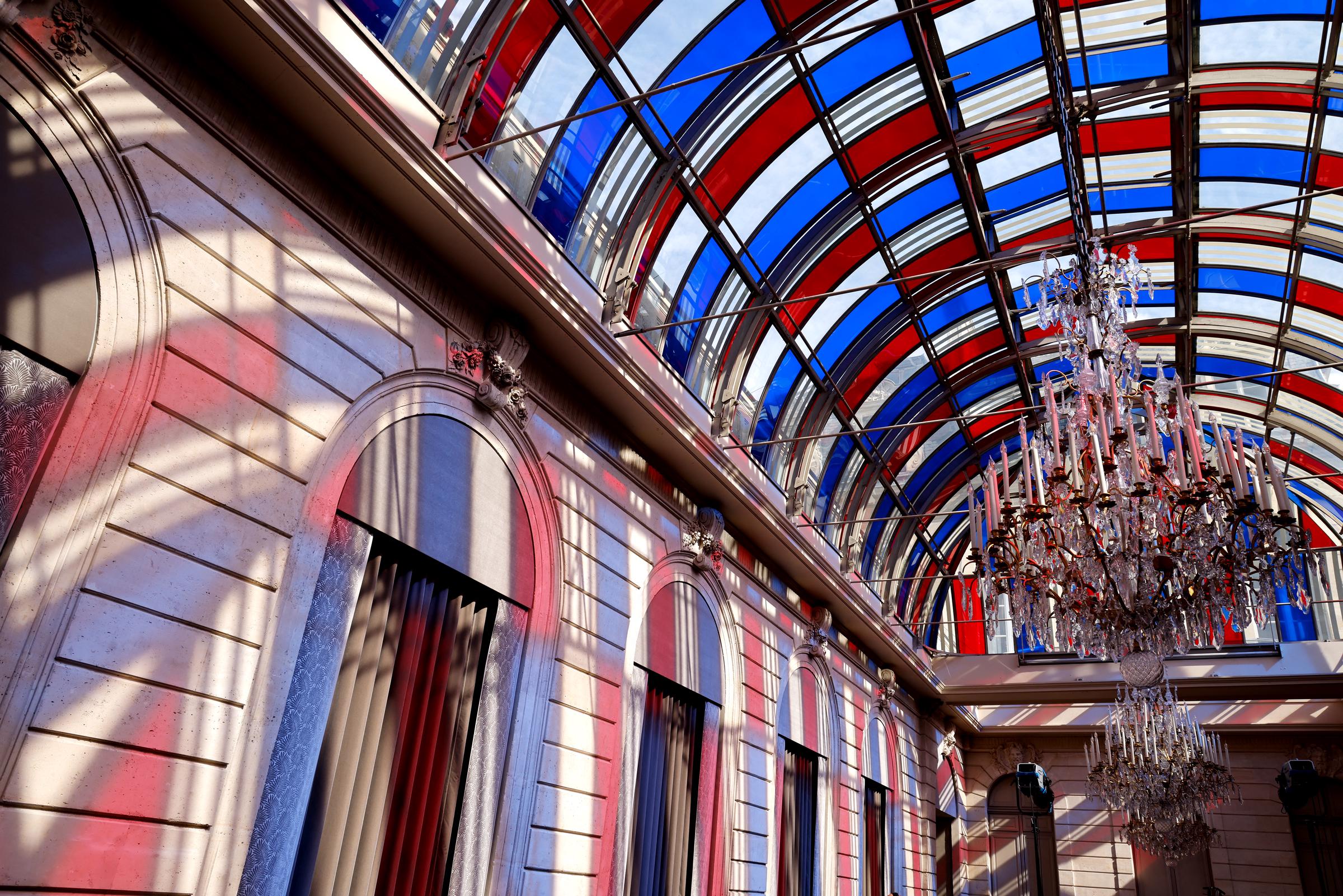 A photo showing the Winter Garden illuminated with a tricolor stained glass window in Paris, France on September 5, 2022. | Source: Getty Images