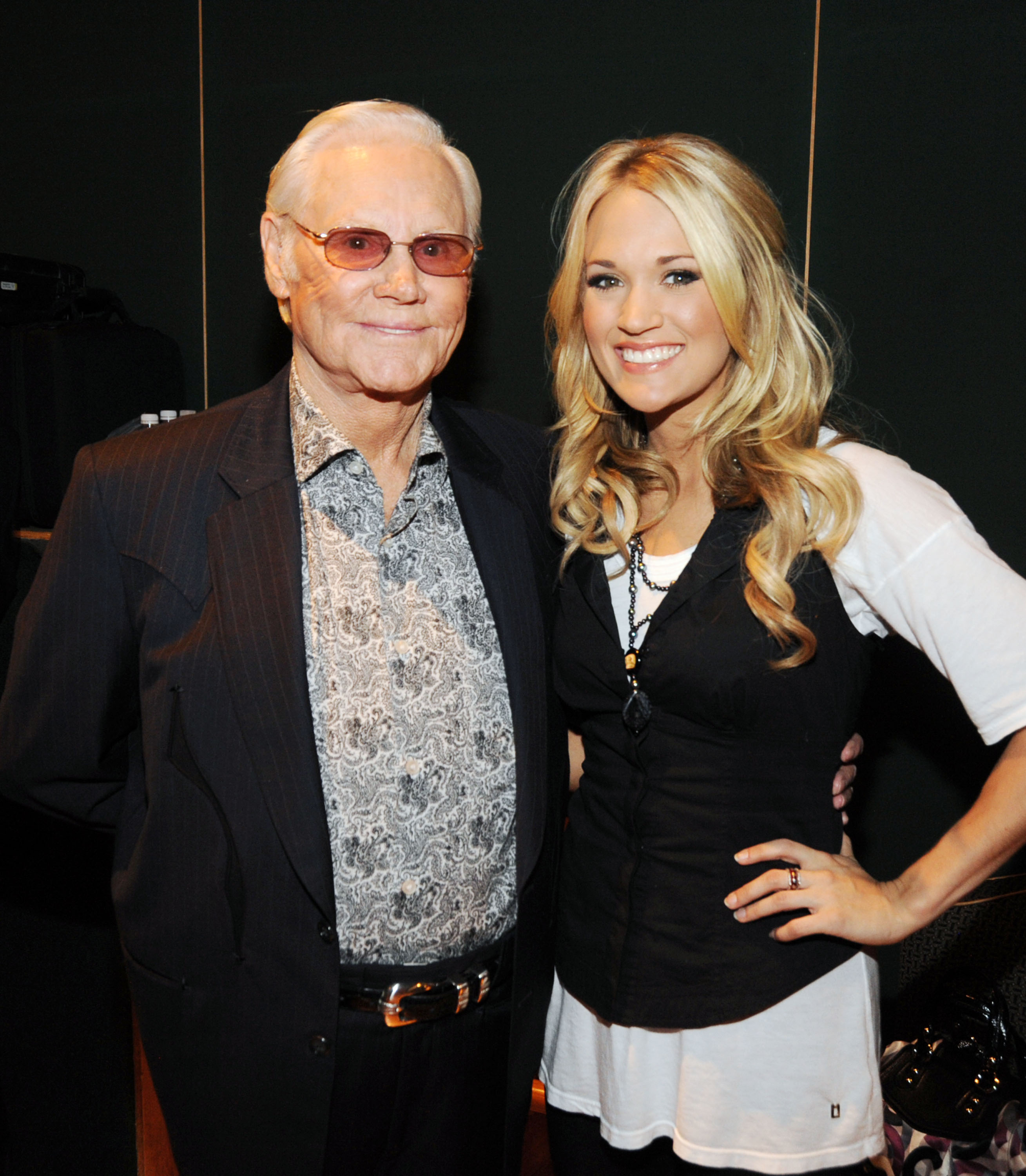 In November 2009, Carrie was photographed with country music veteran George Jones at another Nashville event celebrating Dolly's music. | Source: Getty Images