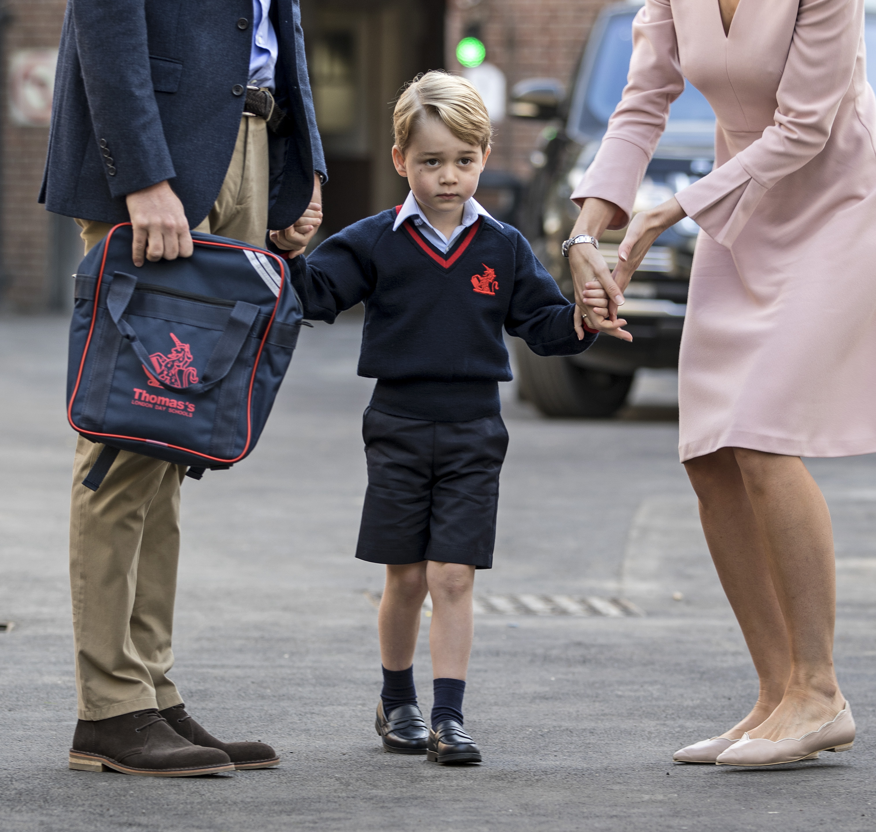 A more direct preview of George's Eton milestone came on September 7, when the 4-year-old arrived for his first day at Thomas’s Battersea. Nine years later, another first day of school would show just how much he had changed.