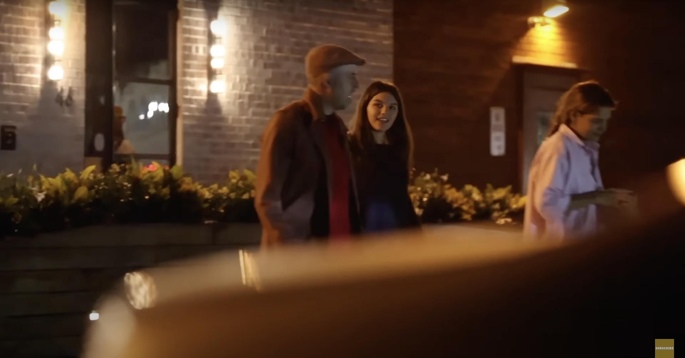 Suri Cruise is spotted standing on the street, sharing a light moment with an unidentified individual. Her smile is effortless, lighting up the candid exchange as the two engage in conversation. Source: YouTube/pagesix