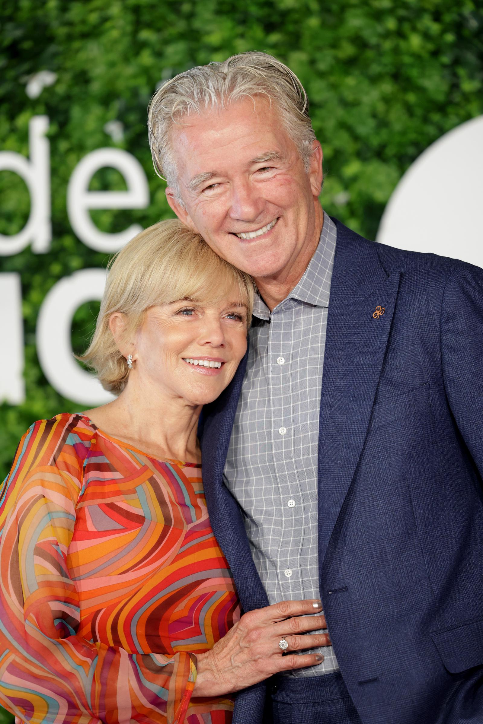 Leaning lovingly against partner Patrick Duffy at the 62nd Monte Carlo TV Festival photocall for "The Bold And The Beautiful" on June 19, 2023, 67-year-old Linda Purl beamed with radiant warmth. A vibrantly patterned, swirl-print silk dress in fiery shades of orange, red, and yellow highlighted her youthful glow, complemented by a chic, polished platinum-blonde bob with straight-across bangs that framed her smiling eyes. | Source: Getty Images