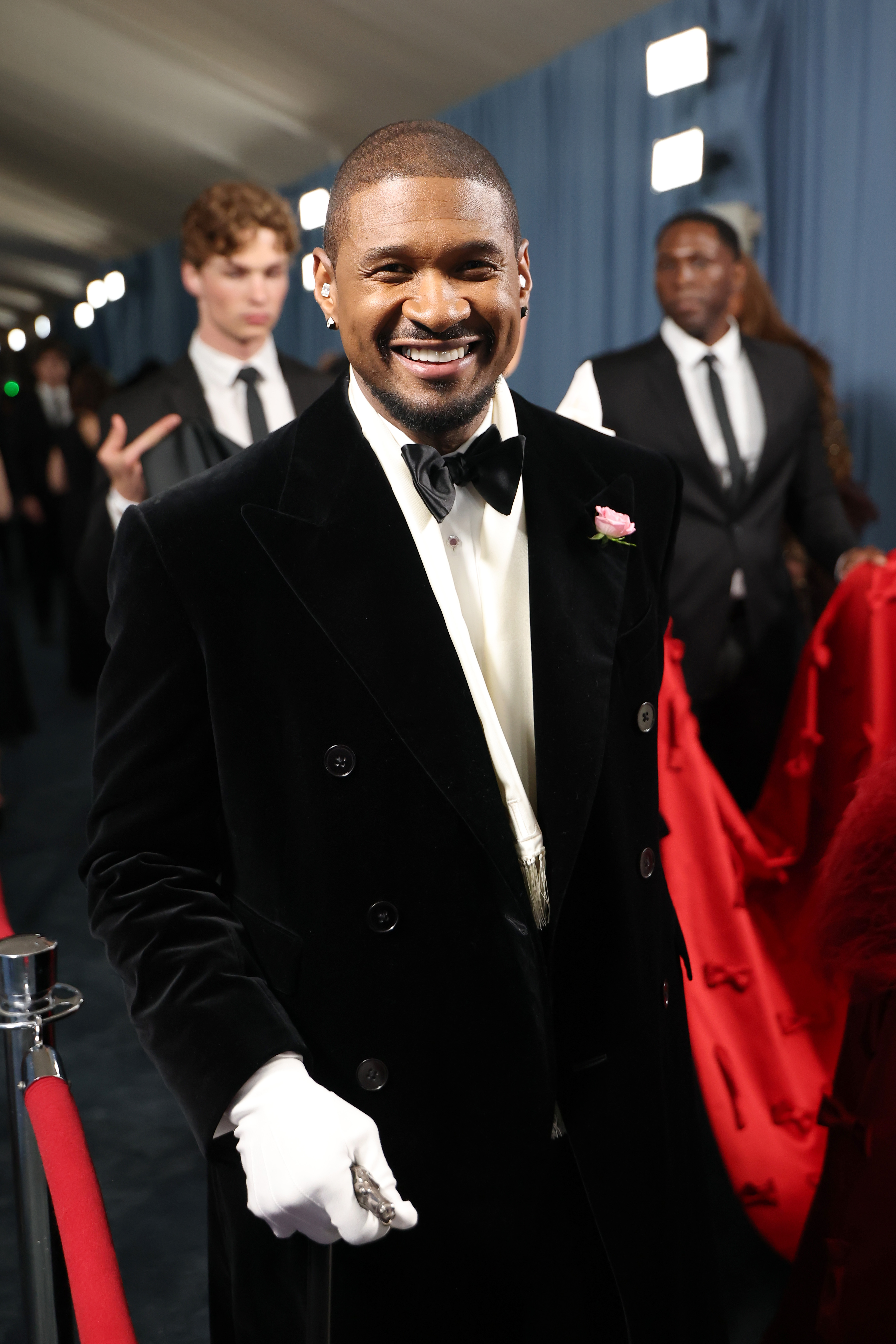 Usher smiles during his appearance at the Met Gala on May 5, 2025, in New York City | Source: Getty Images