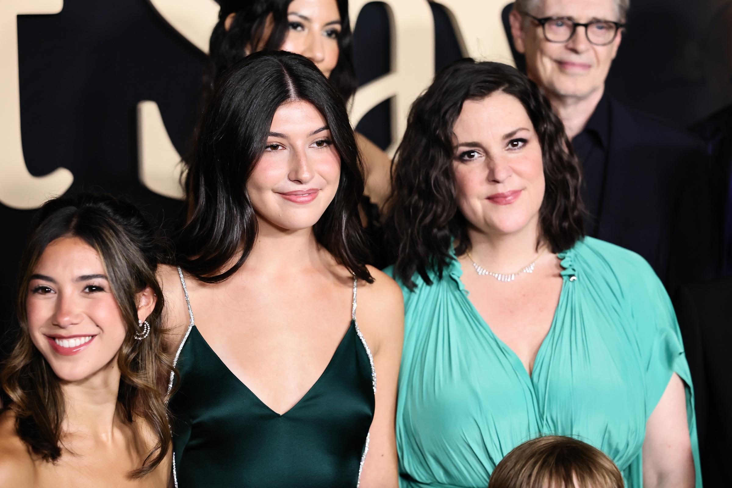 Sunny Sandler poses with Melanie Lynskey and fellow cast members at the "Don't Say Good Luck" premiere, where the young actor celebrated the film alongside her costars. | Source: Getty Images
