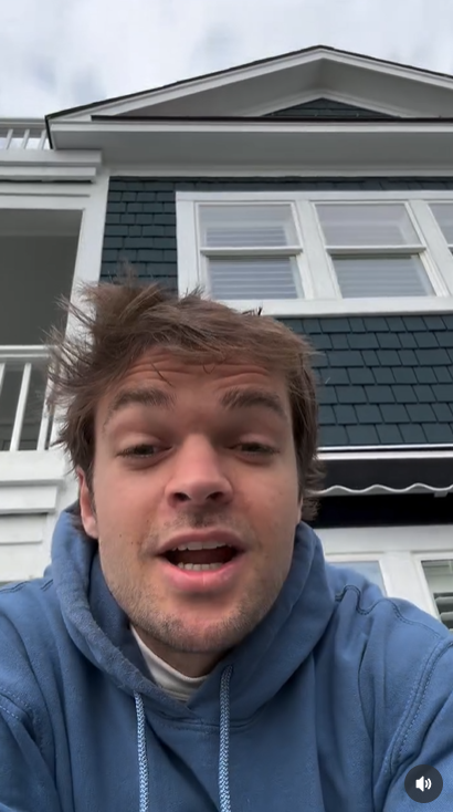 Conner Smith speaks in a video message outside a house, following his nomination for New Male Artist of the Year, posted in April 2024 | Source: Instagram/connersmithmusic