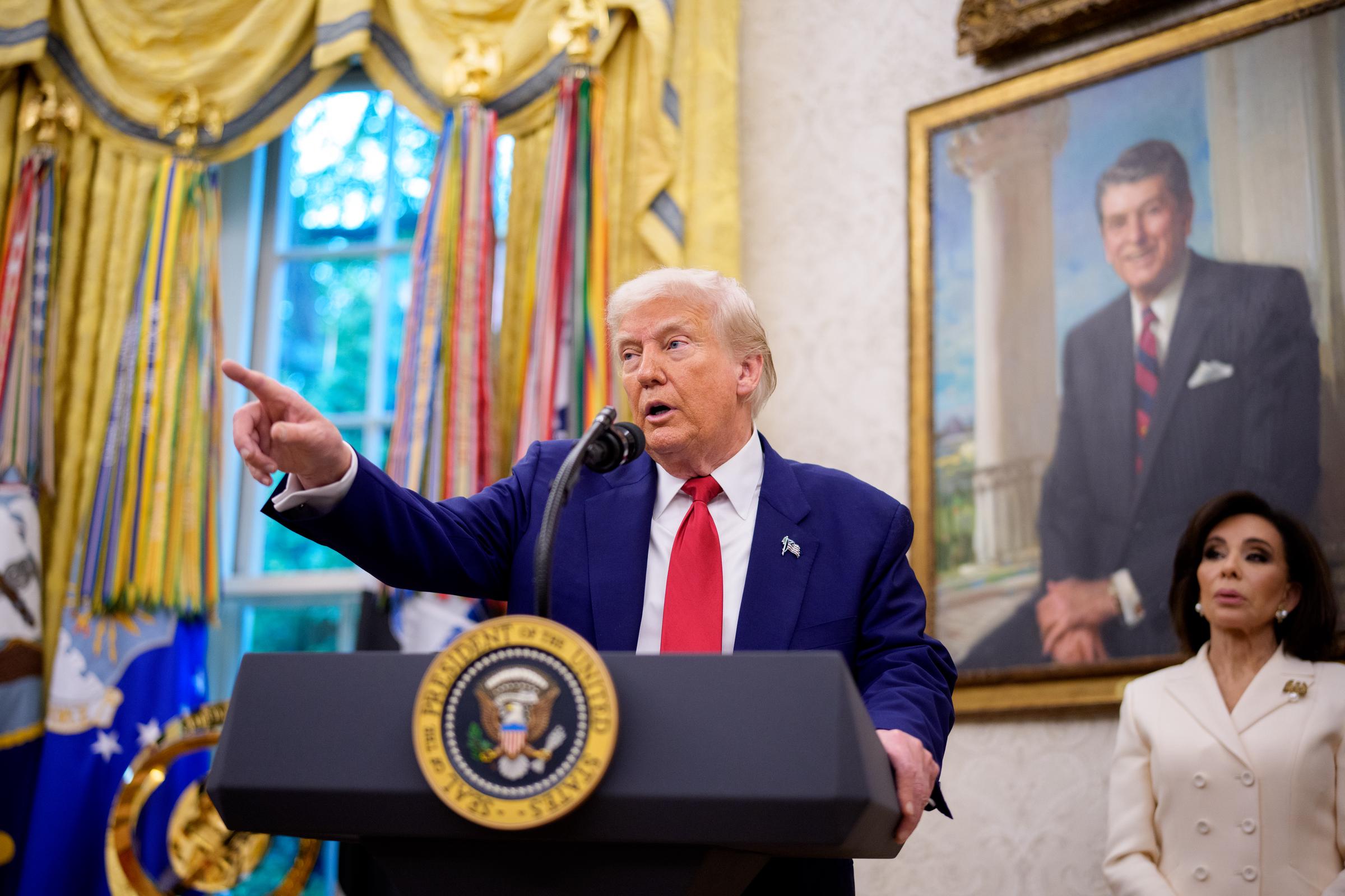 President Donald Trump speaks during a swearing in ceremony for interim U.S. Attorney for Washington, D.C. Jeanine Pirro in the Oval Office of the White House on May 28, 2025, in Washington, DC. | Source: Getty Images