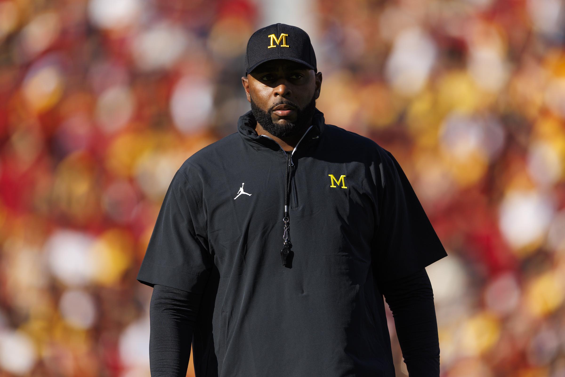 Sherrone Moore on the field before the game against USC Trojans on October 11, 2025 | Source: Getty Images