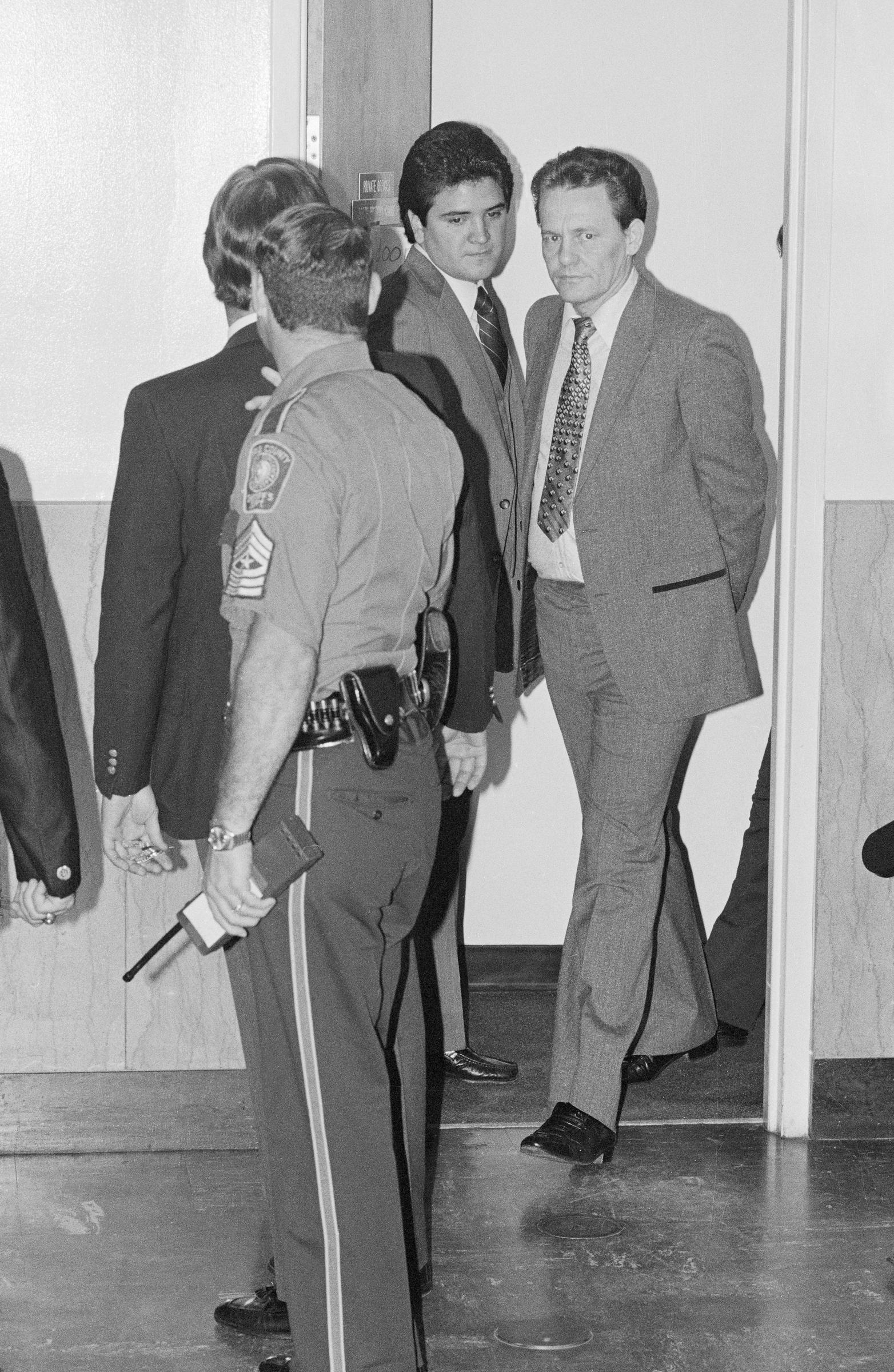 Charles V. Harrelson being led out of the courtroom and back into prison in an undated image. | Source: Getty Images
