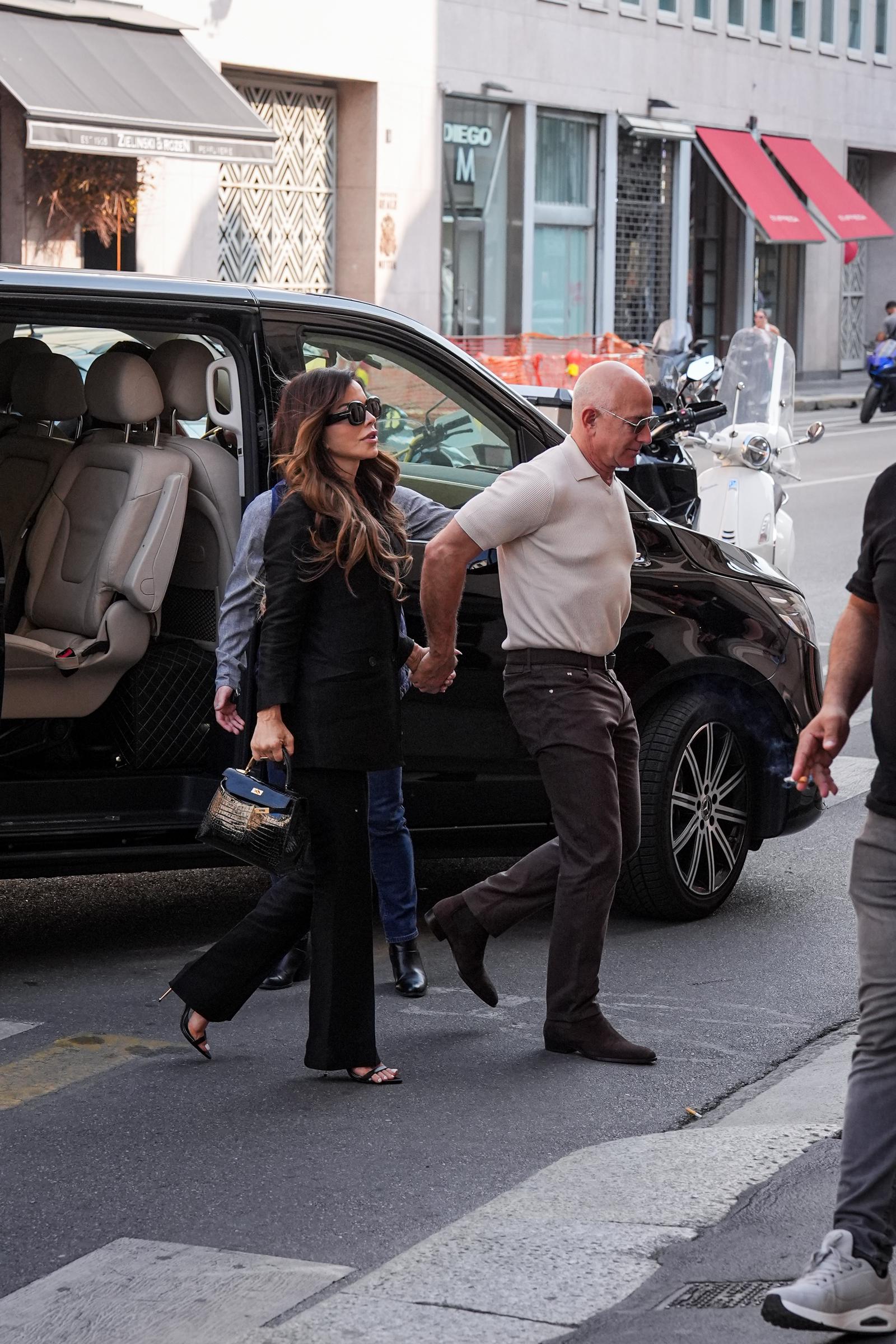 Jeff Bezos and Lauren Sanchez spotted arriving at the Dolce & Gabbana Martini Bar in Milan on June 8, 2025, days ahead of their wedding | Source: Getty Images
