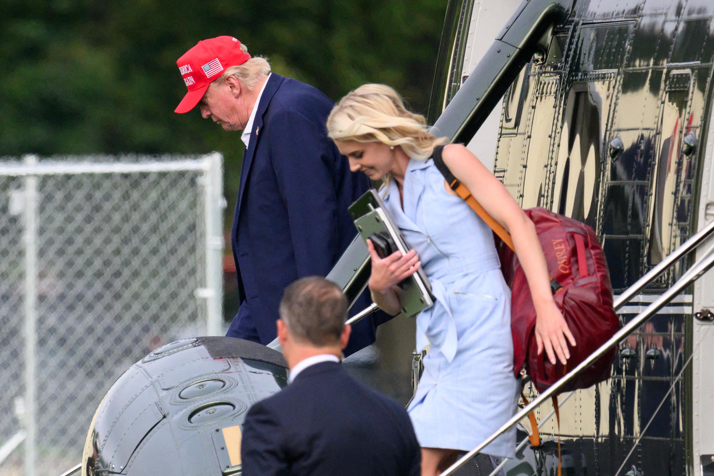 Donald Trump and aide Natalie Harp exit Marine One near the White House on August 16, 2026, highlighting the close proximity that has made her a notable figure in the president’s inner circle. | Source: Getty Images
