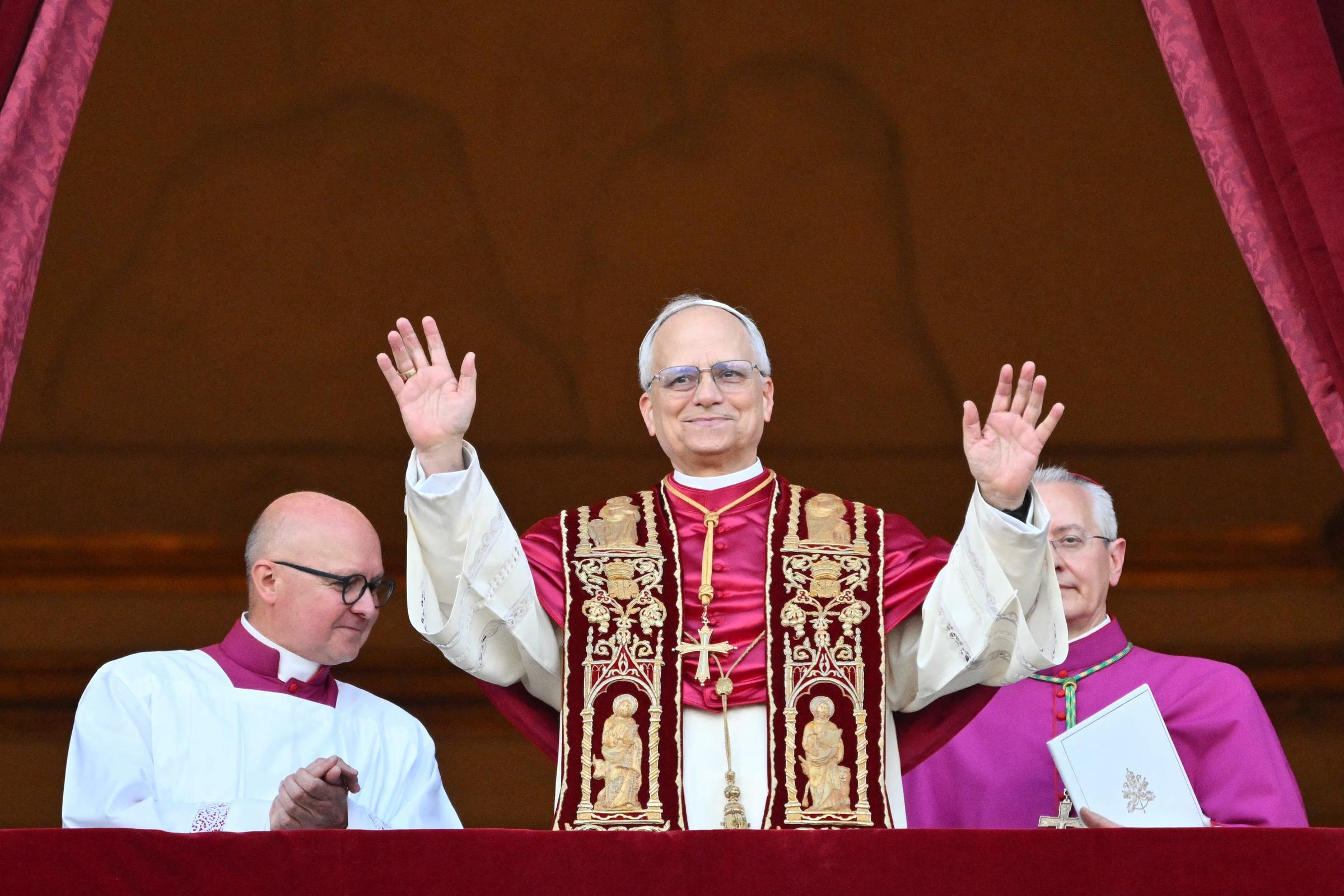 Newly elected Pope Leo XIV, Robert Francis Prevost, arrives on the main central loggia balcony of the St Peter's Basilica for the first time, after the cardinals ended the conclave, in The Vatican, on May 8, 2025 | Source: Getty Images