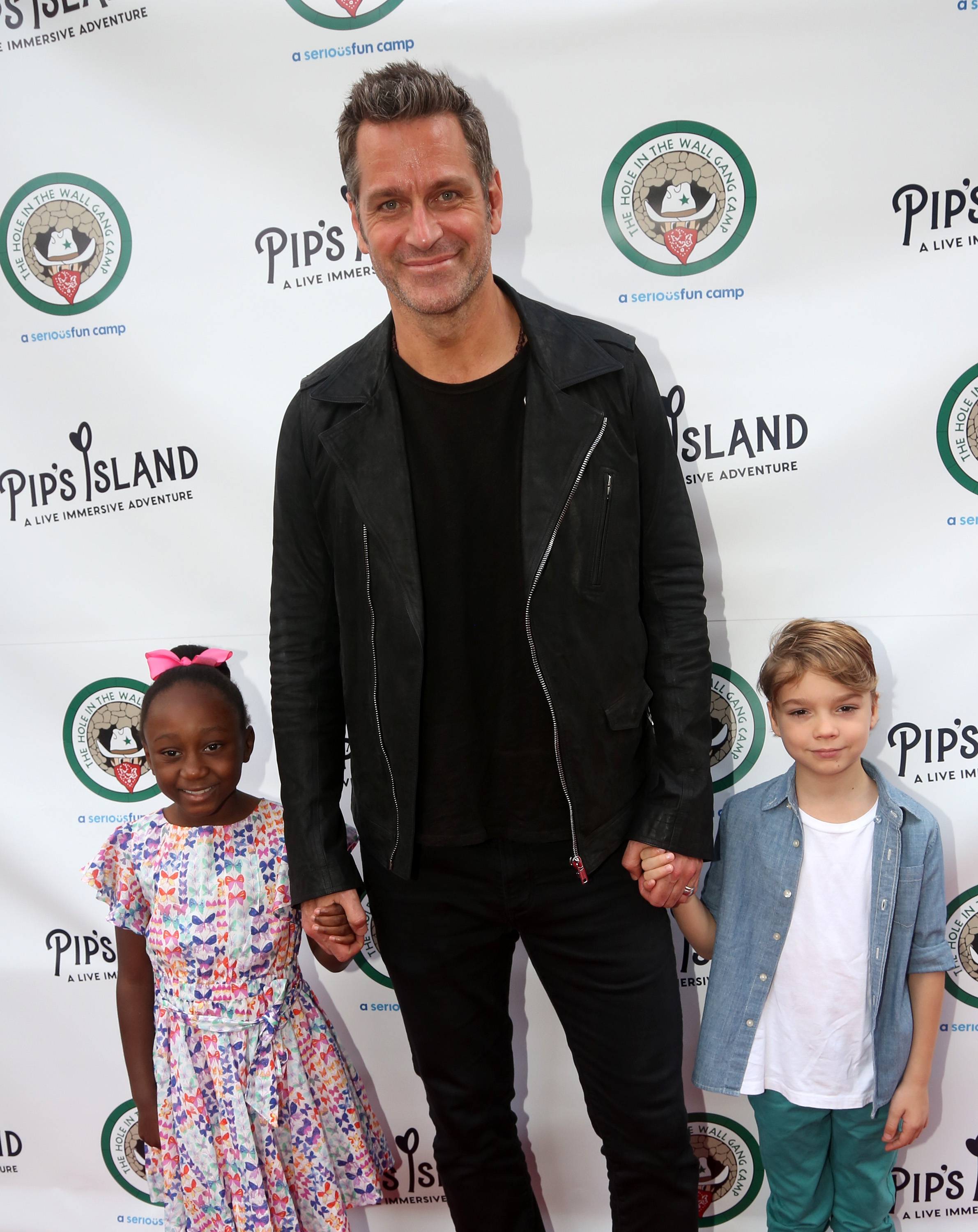 Amaya, Peter, and Andrew Hermann pose at the opening night celebration for "Pip's Island" on May 20, 2019, in New York City. | Source: Getty Images