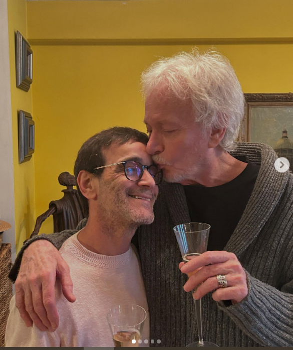 Anthony Geary and his husband Claudio Gama being affectionate while celebrating their anniversary, from a post dated February 12, 2025 | Source: Instagram/claudiogama_71