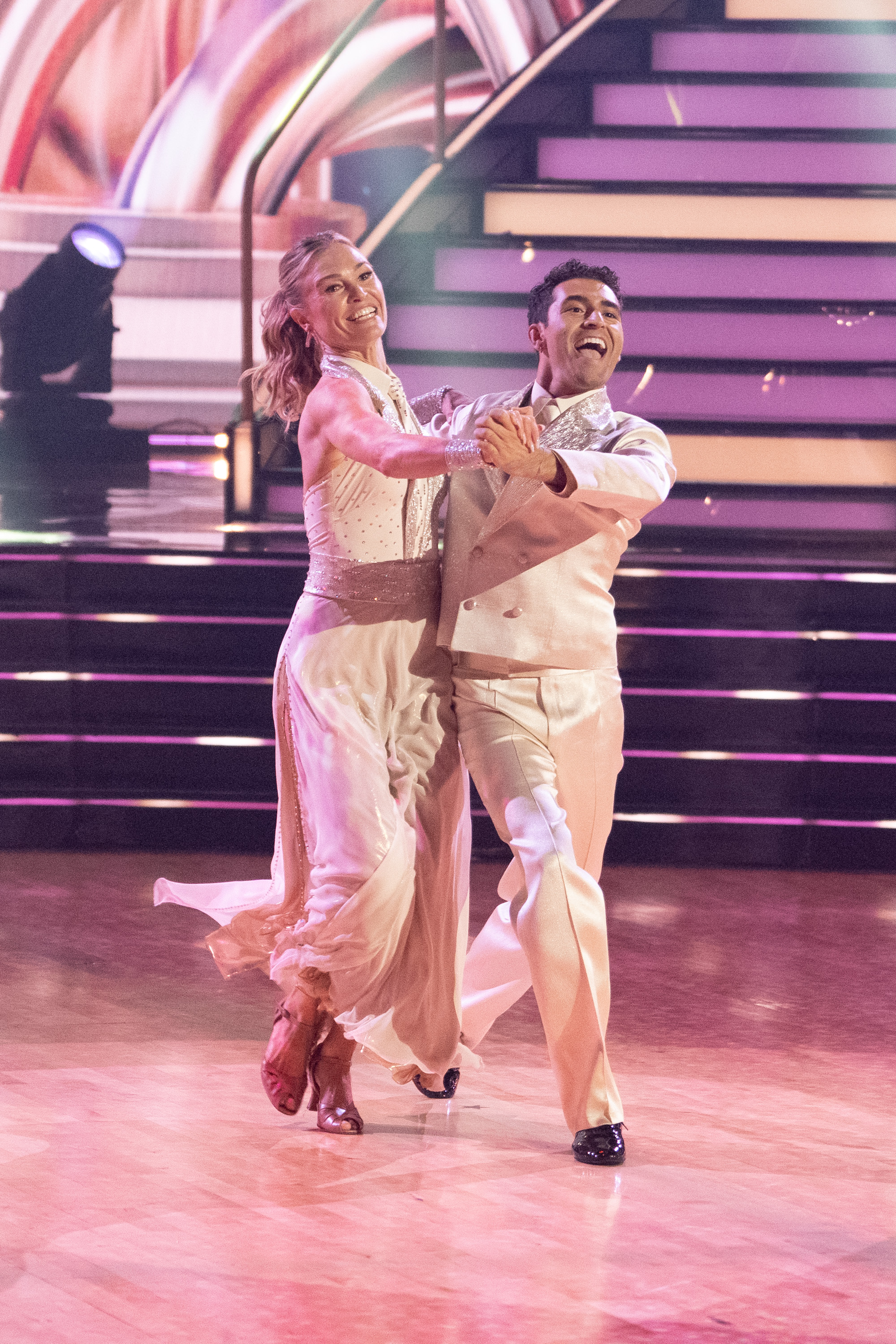 Julia Stiles and Ezra Sosa perform to Dolly Parton's "9 to 5" during the second night of the Season 35 premiere. Stiles said she wanted the performance to honor Parton's legacy after learning that Parton had personally approved the song for her. | Source: Getty Images