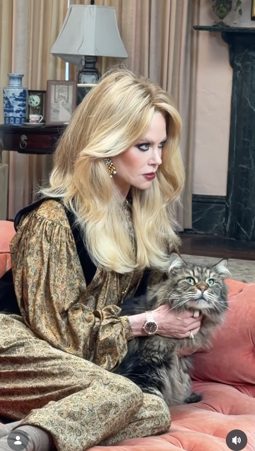 Nicole Kidman poses with a fluffy cat during her British Vogue cover shoot, adding a playful touch to the glamorous spread. The relaxed moment fits the actress’s candid approach to life, as she reflects on following her feelings and leading with her heart. | Source: Instagram/britishvogue