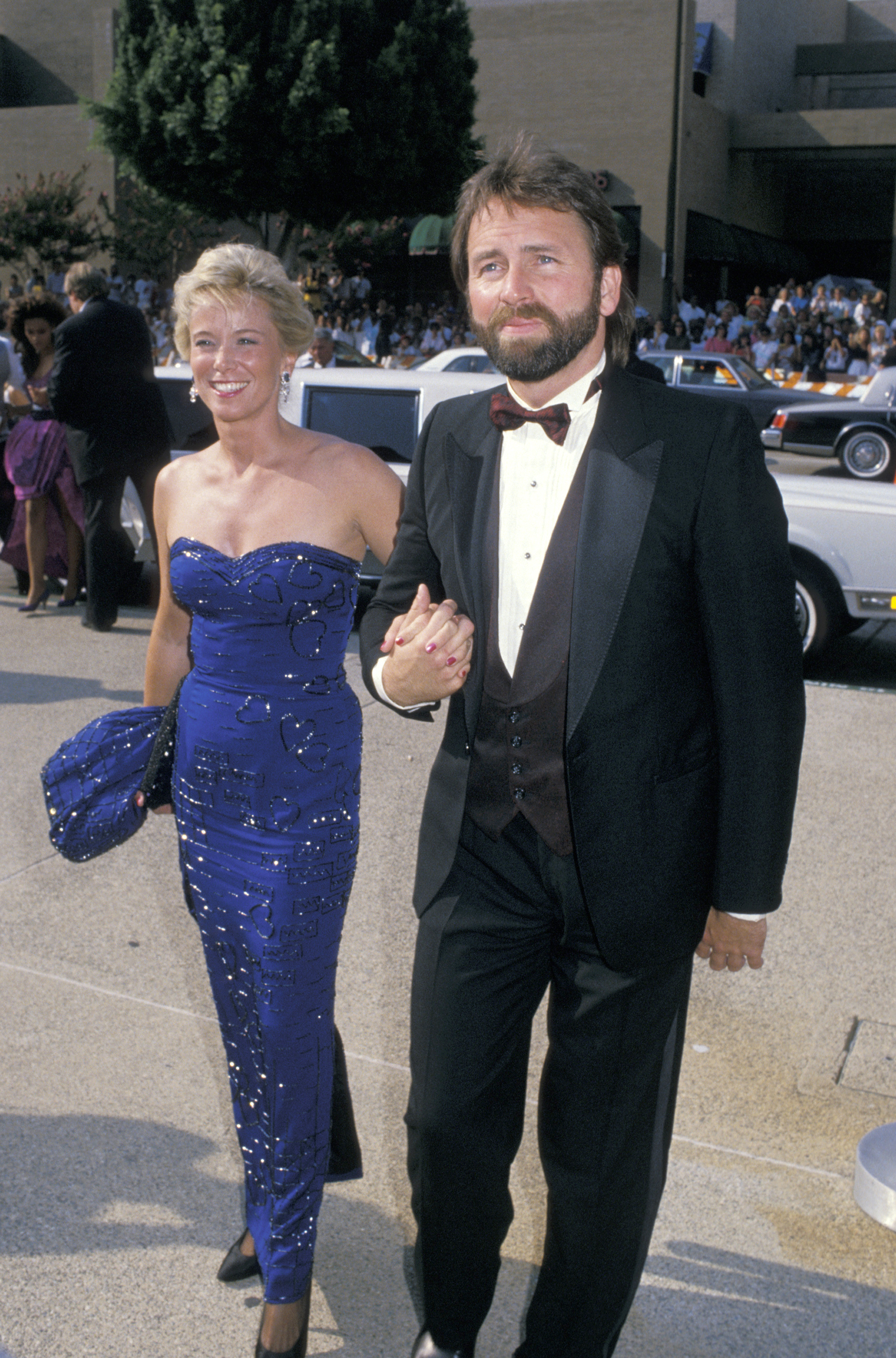 By 1987, John was widening his film career with comedies such as "Real Men." His marriage to Nancy remained part of his life as he continued moving between television and movies. | Source: Getty Images